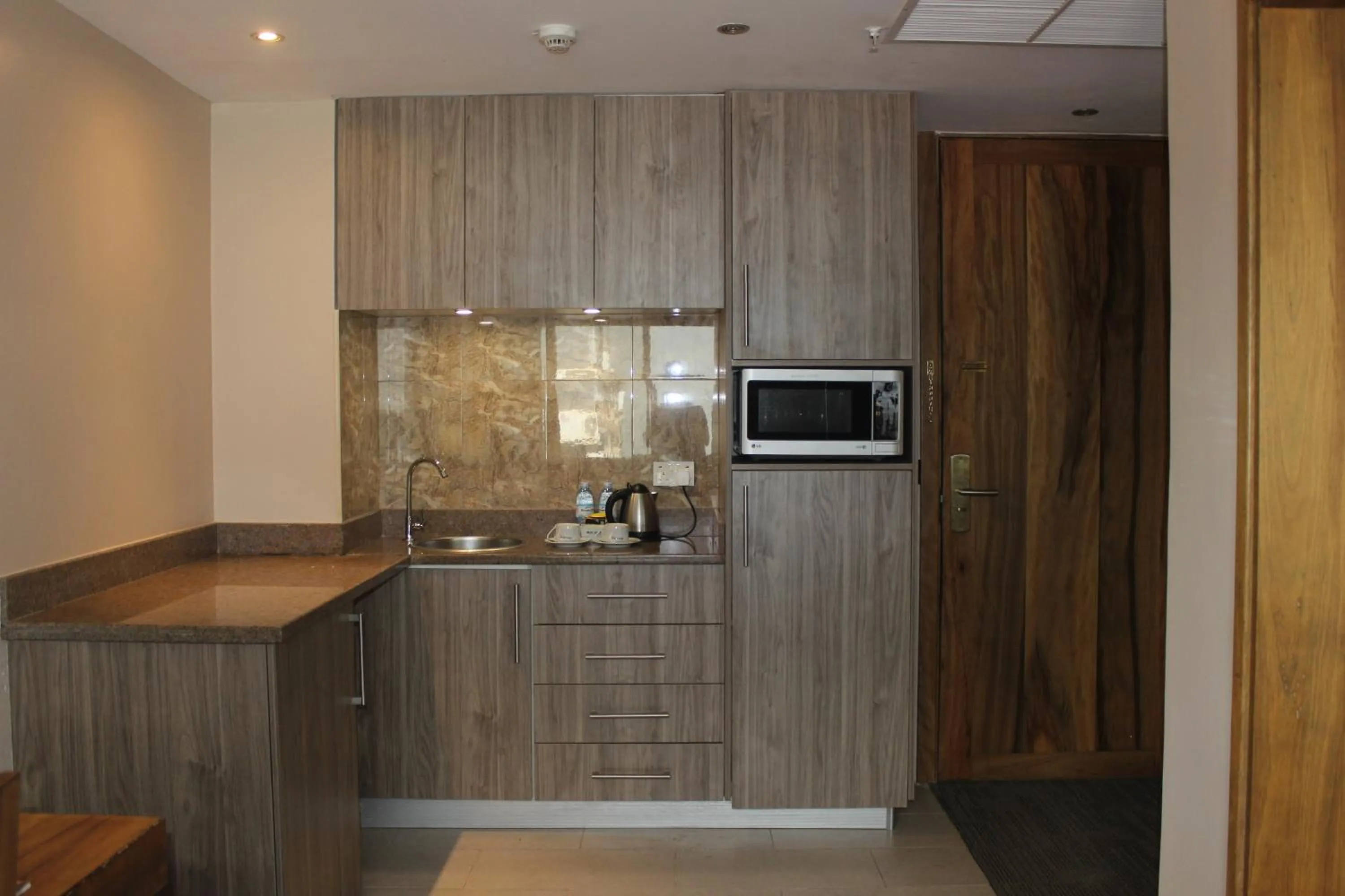 Kitchen or kitchenette in Arcadia Suites - Kampala