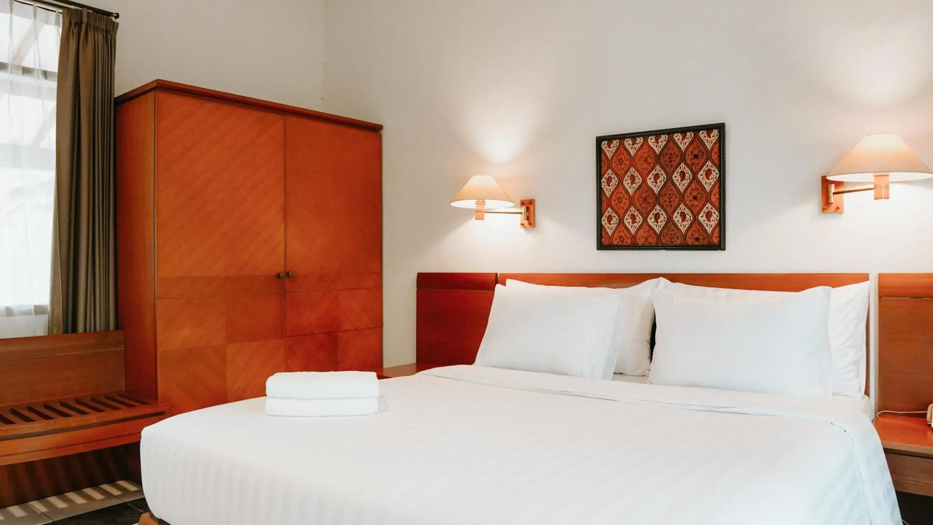 Deluxe Double Room (2 Adults + 1 Child) - single occupancy in Tidar Hotel & Cottages Malang Deluxe Double Room (2 Adults + 1 Child) - single occupancy in Tidar Hotel & Cottages Malang