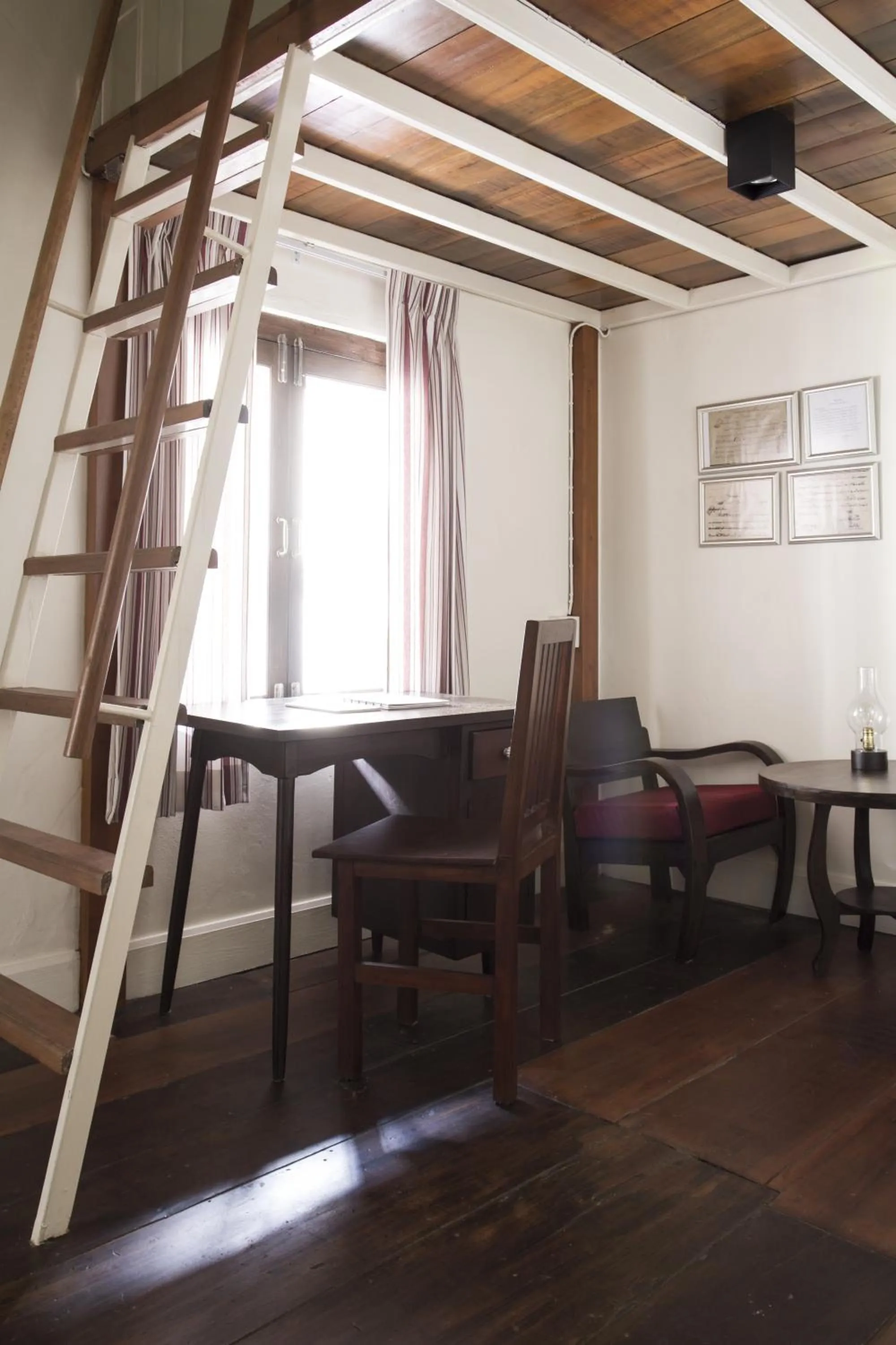 Seating area in Baan Luang Rajamaitri Historic Inn