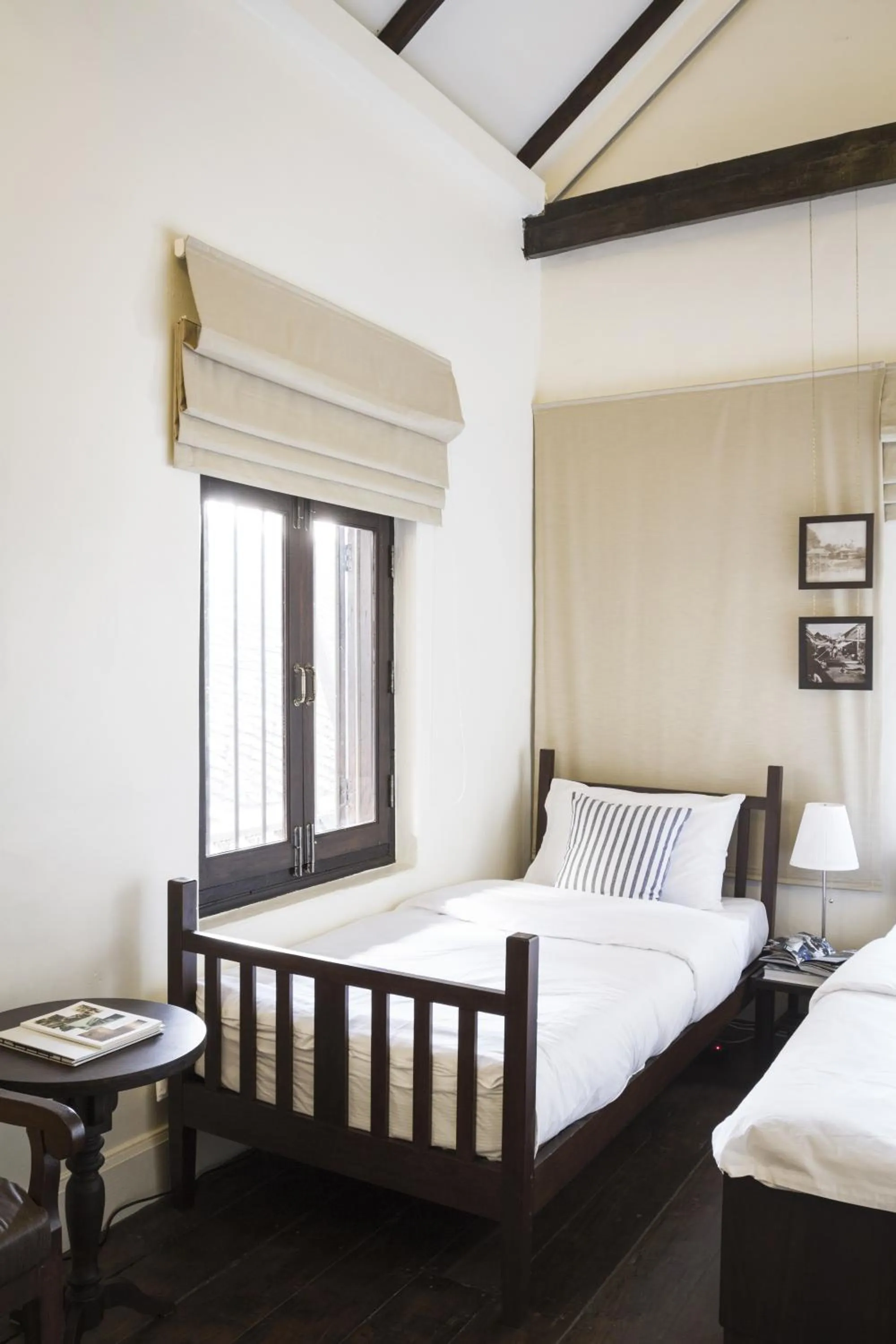 Bed in Baan Luang Rajamaitri Historic Inn