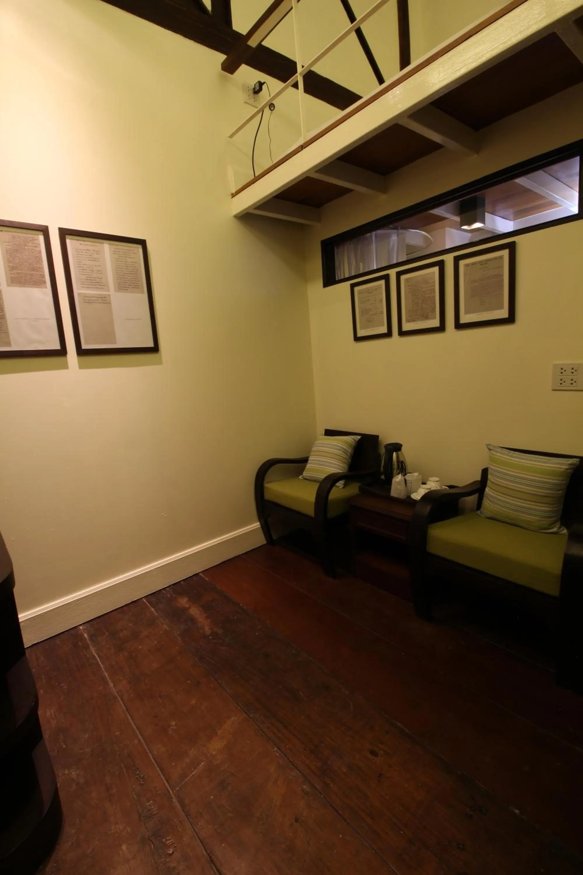 Seating area in Baan Luang Rajamaitri Historic Inn