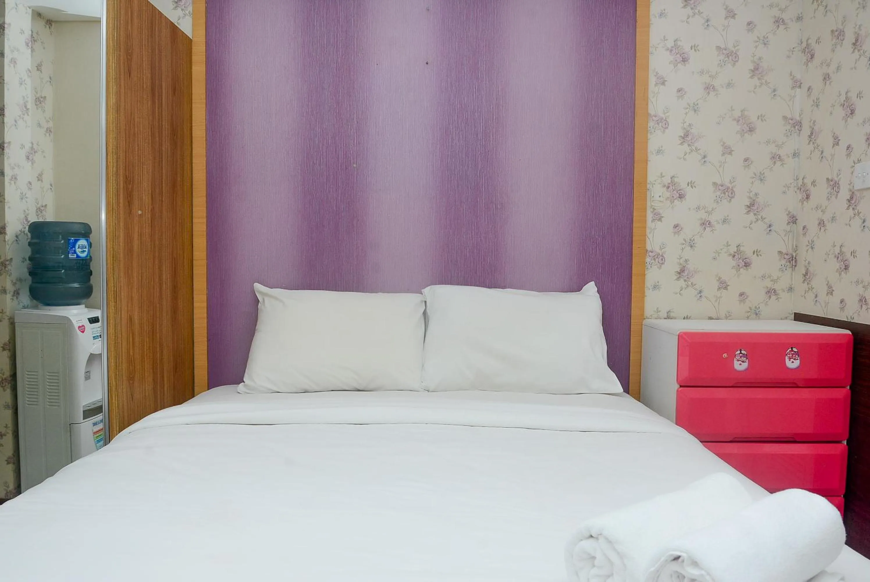 Bed in Homey Studio Pakubuwono Terrace Apartment By Travelio