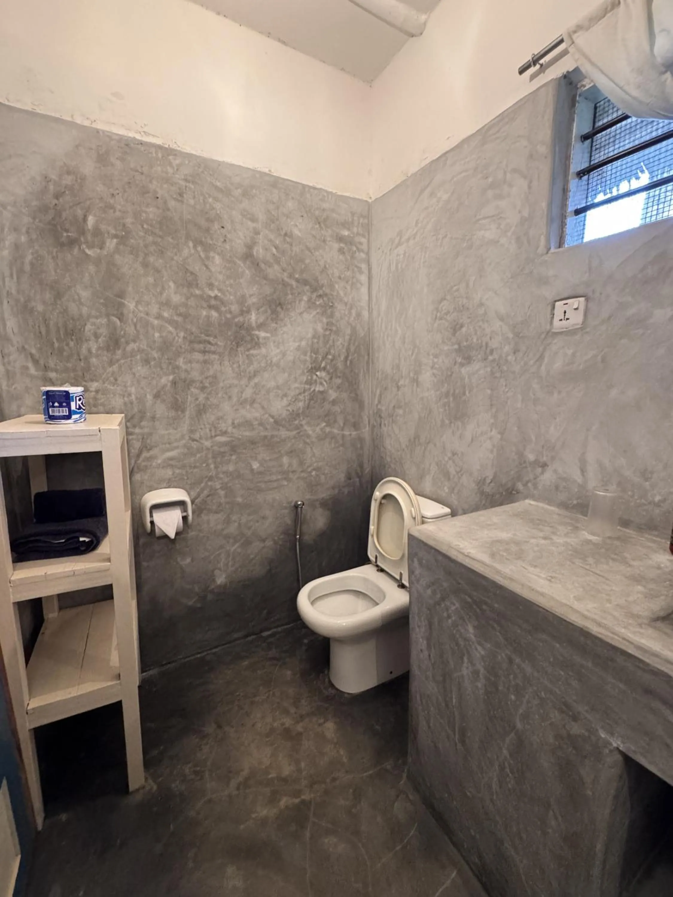 Toilet in Paje By Night Bungalows