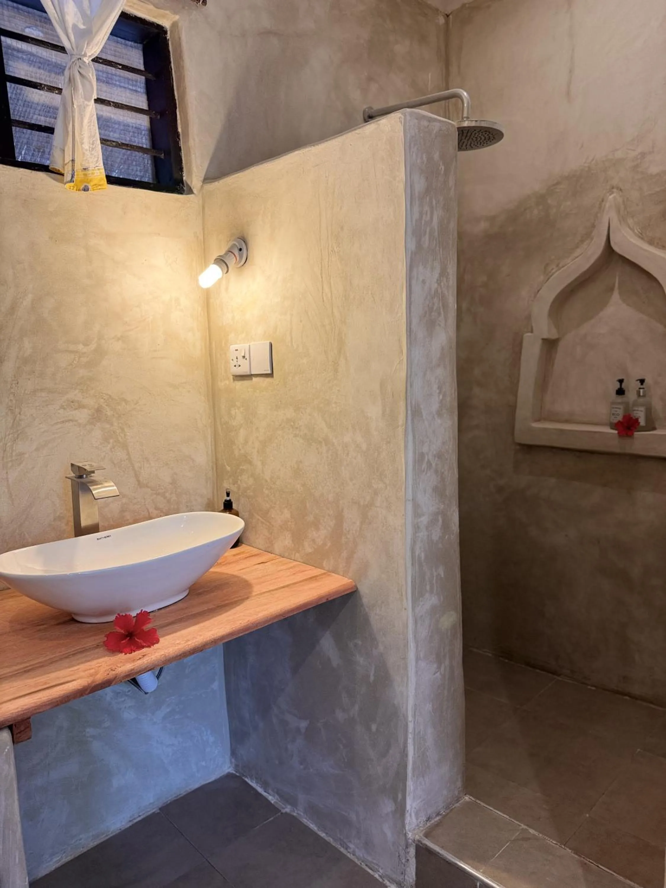 Bathroom in Paje By Night Bungalows
