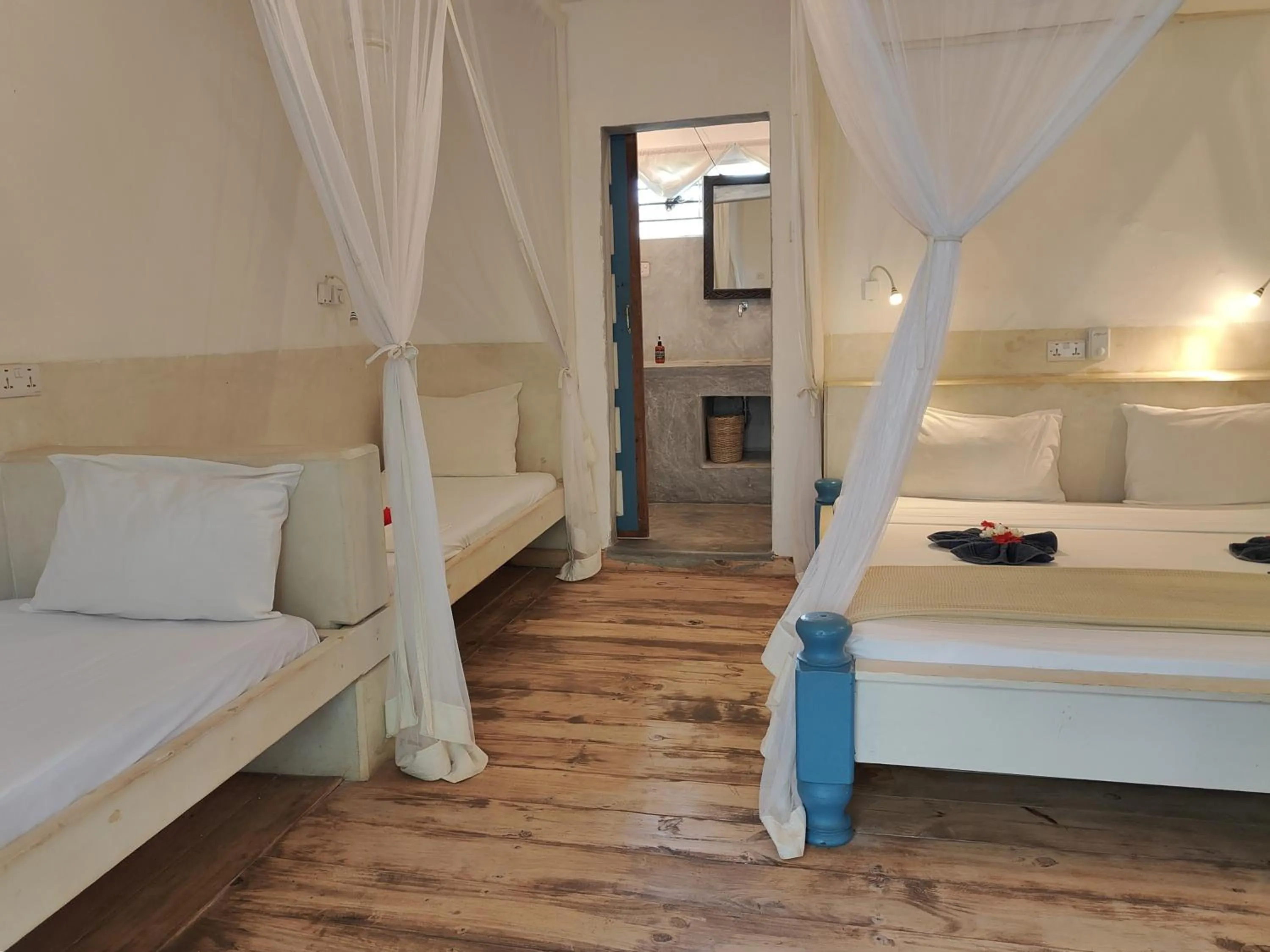 Photo of the whole room, Bed in Paje By Night Bungalows