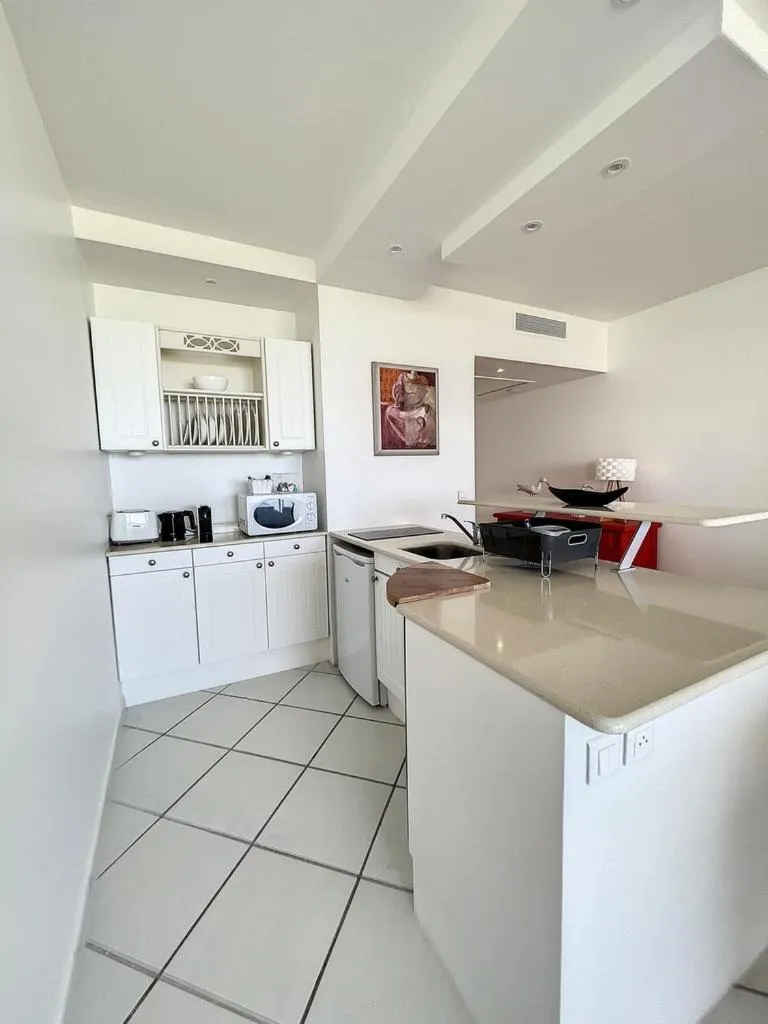 Kitchen or kitchenette in Le Domaine Anse Marcel Beach Resort