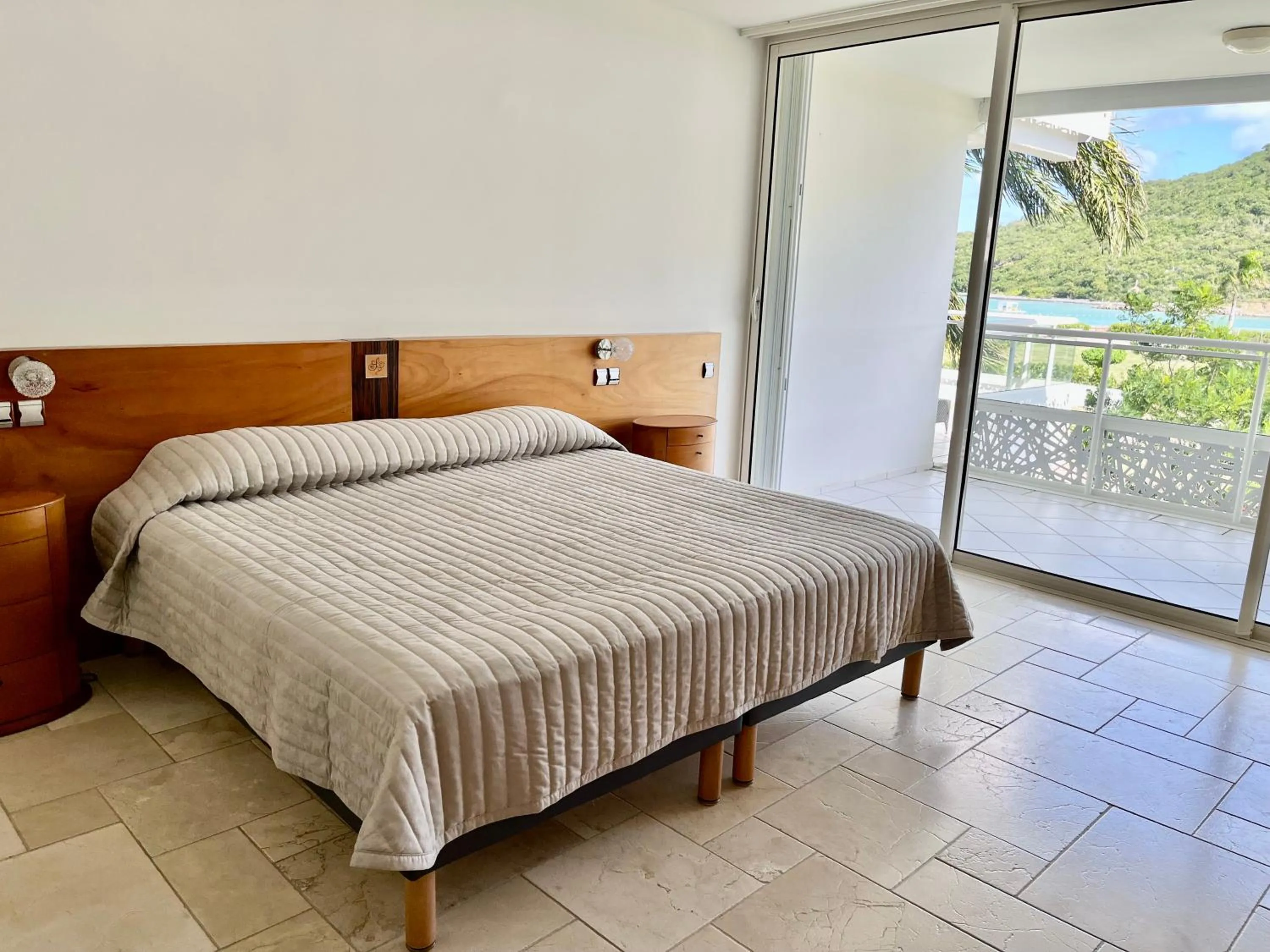 Bed in Le Domaine Anse Marcel Beach Resort