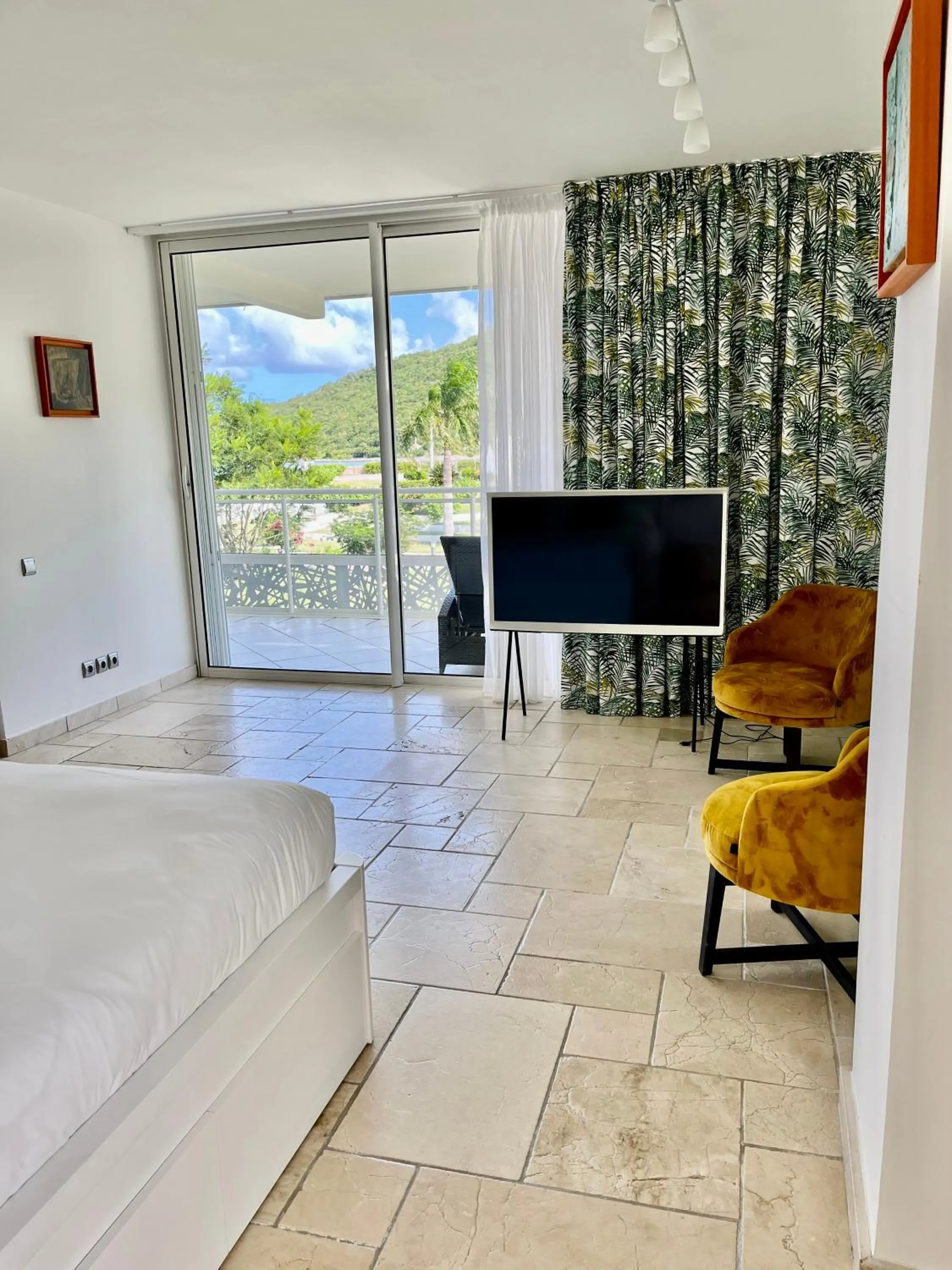 TV and multimedia, Bed in Le Domaine Anse Marcel Beach Resort