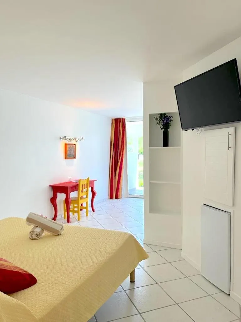 Bed in Le Domaine Anse Marcel Beach Resort