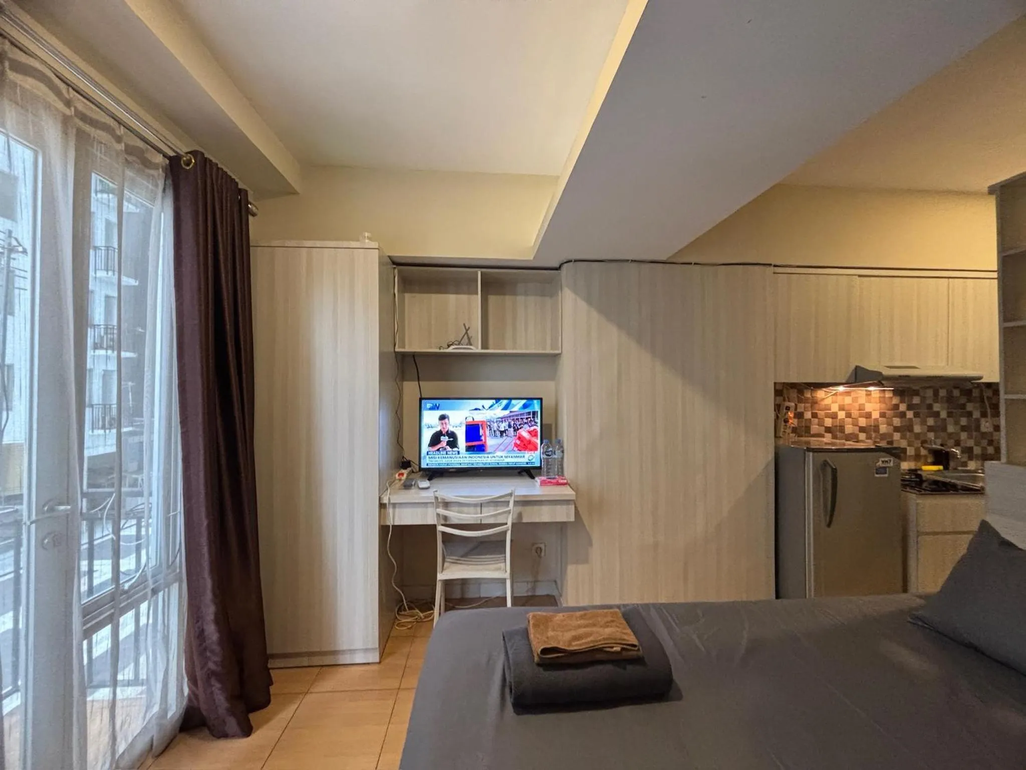 TV and multimedia in The Jarrdin Apartment Hotels by Ironman