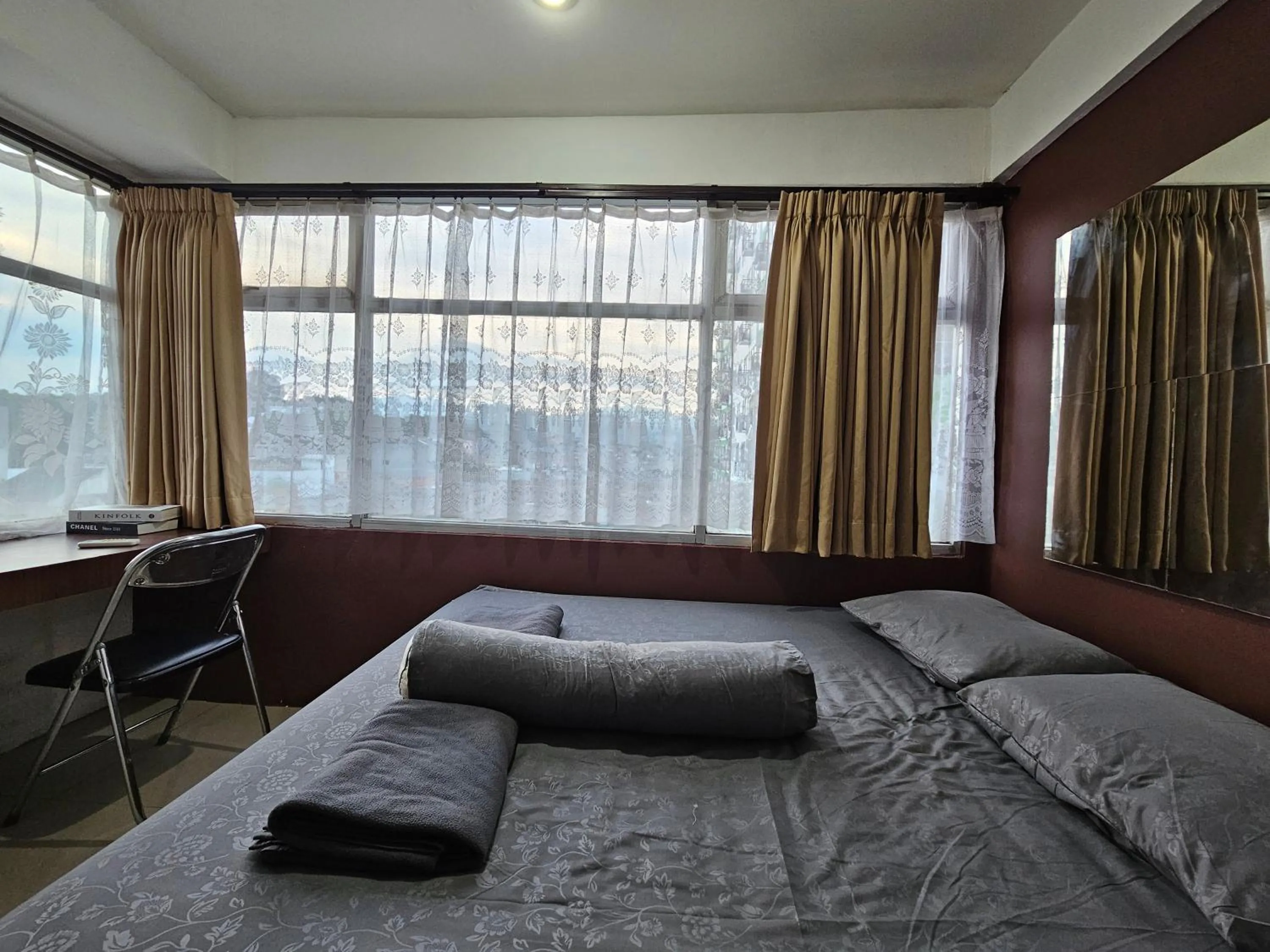 Bed in The Jarrdin Apartment Hotels by Ironman