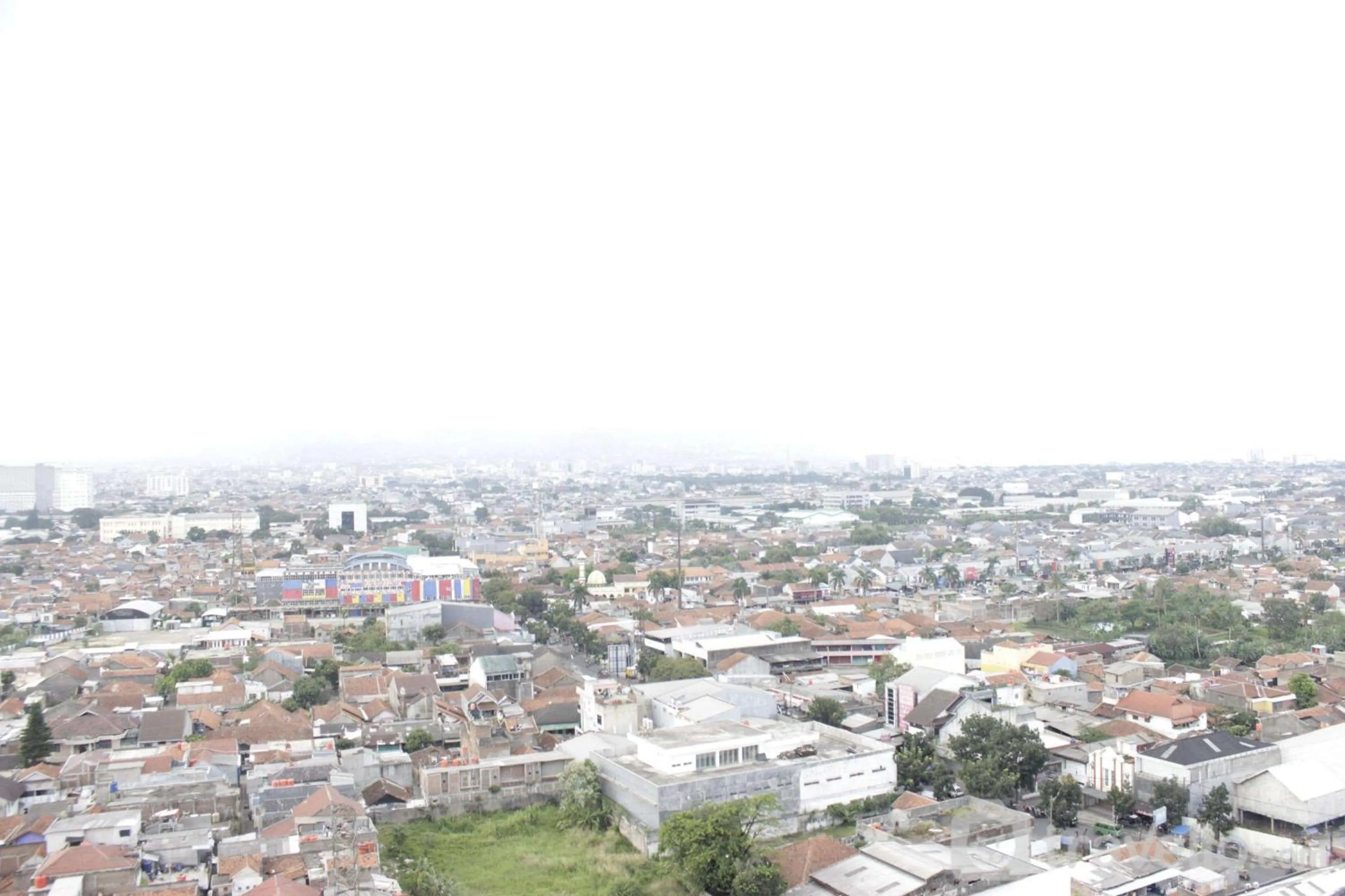 Property building in Comfy 2BR Apartment at Mekarwangi Square Cibaduyut By Travelio