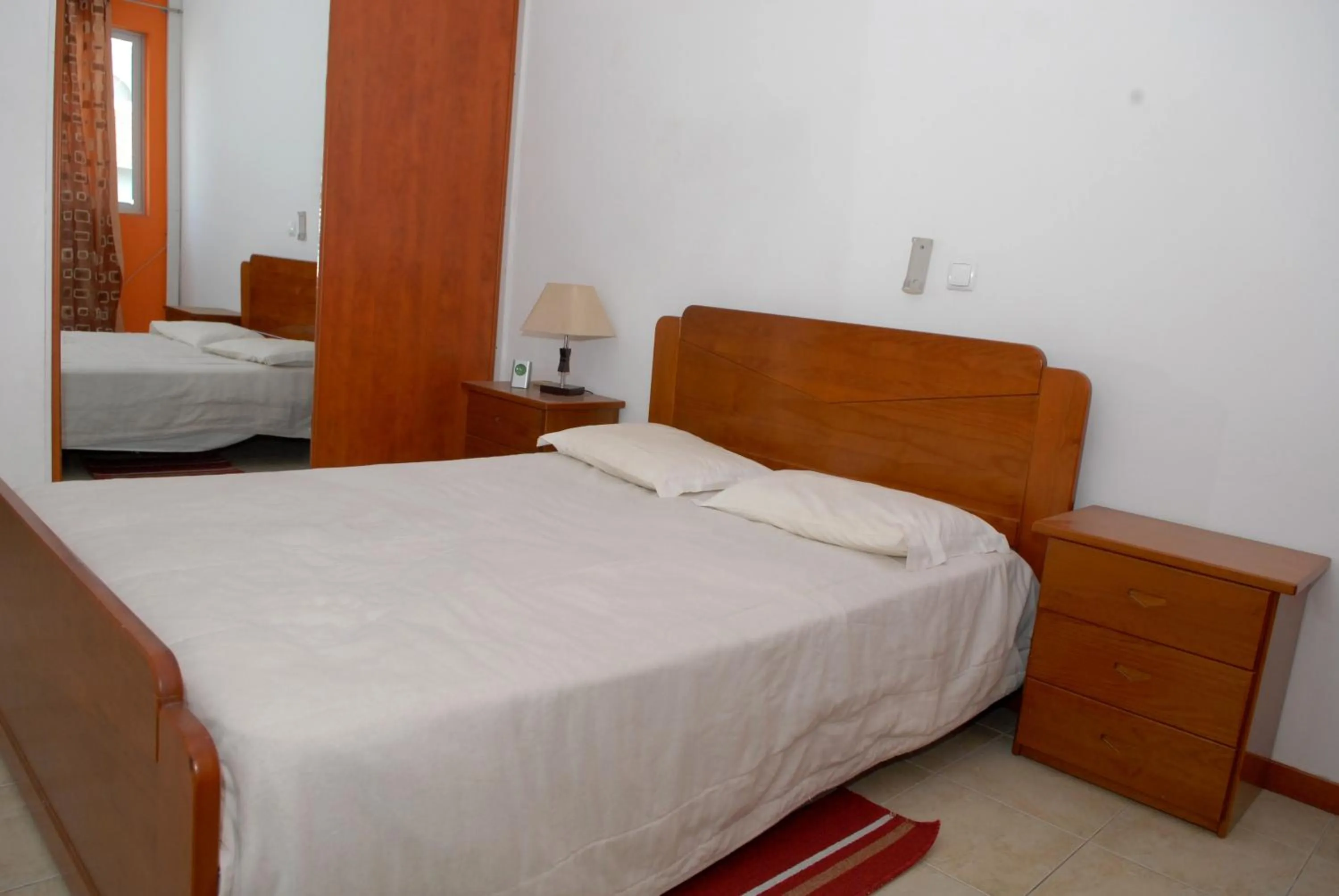 Photo of the whole room, Bed in Apartamentos Santiago - Praia