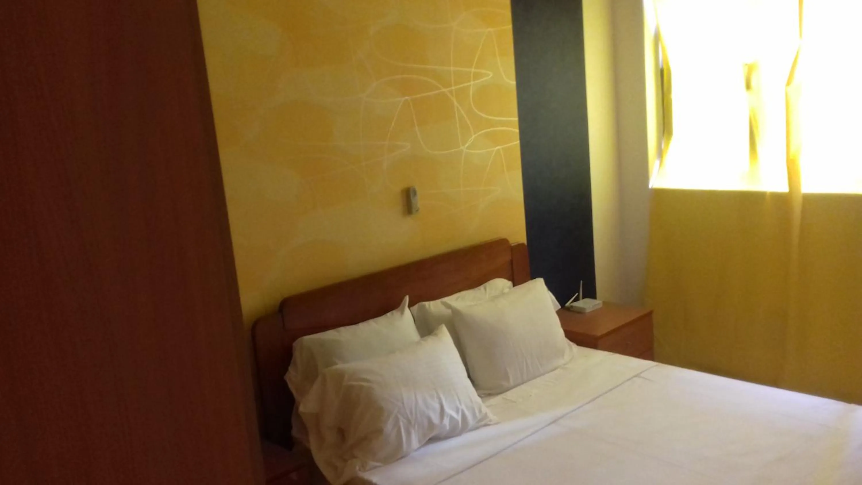 Bed in Apartamentos Santiago - Praia