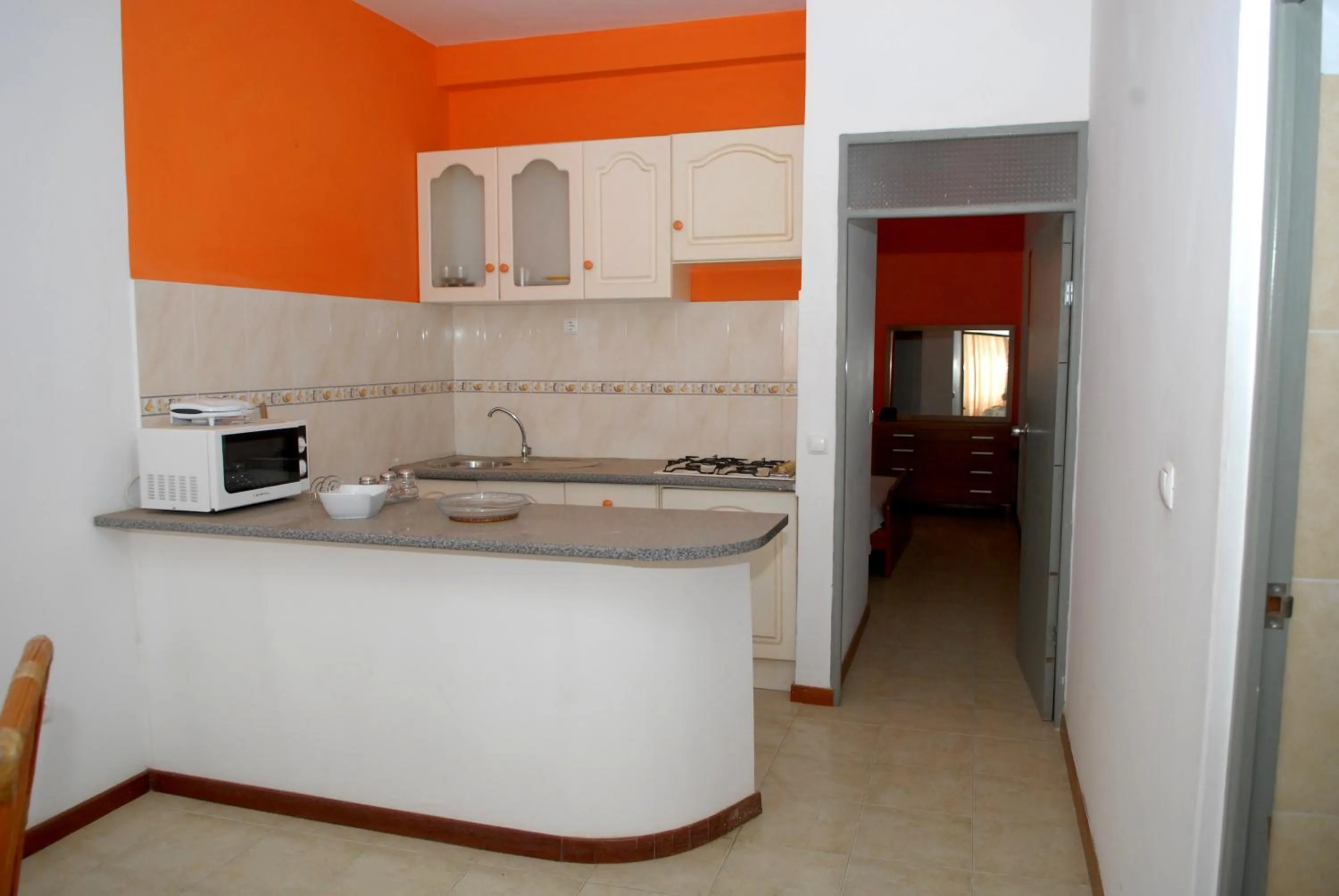 Kitchen or kitchenette in Apartamentos Santiago - Praia