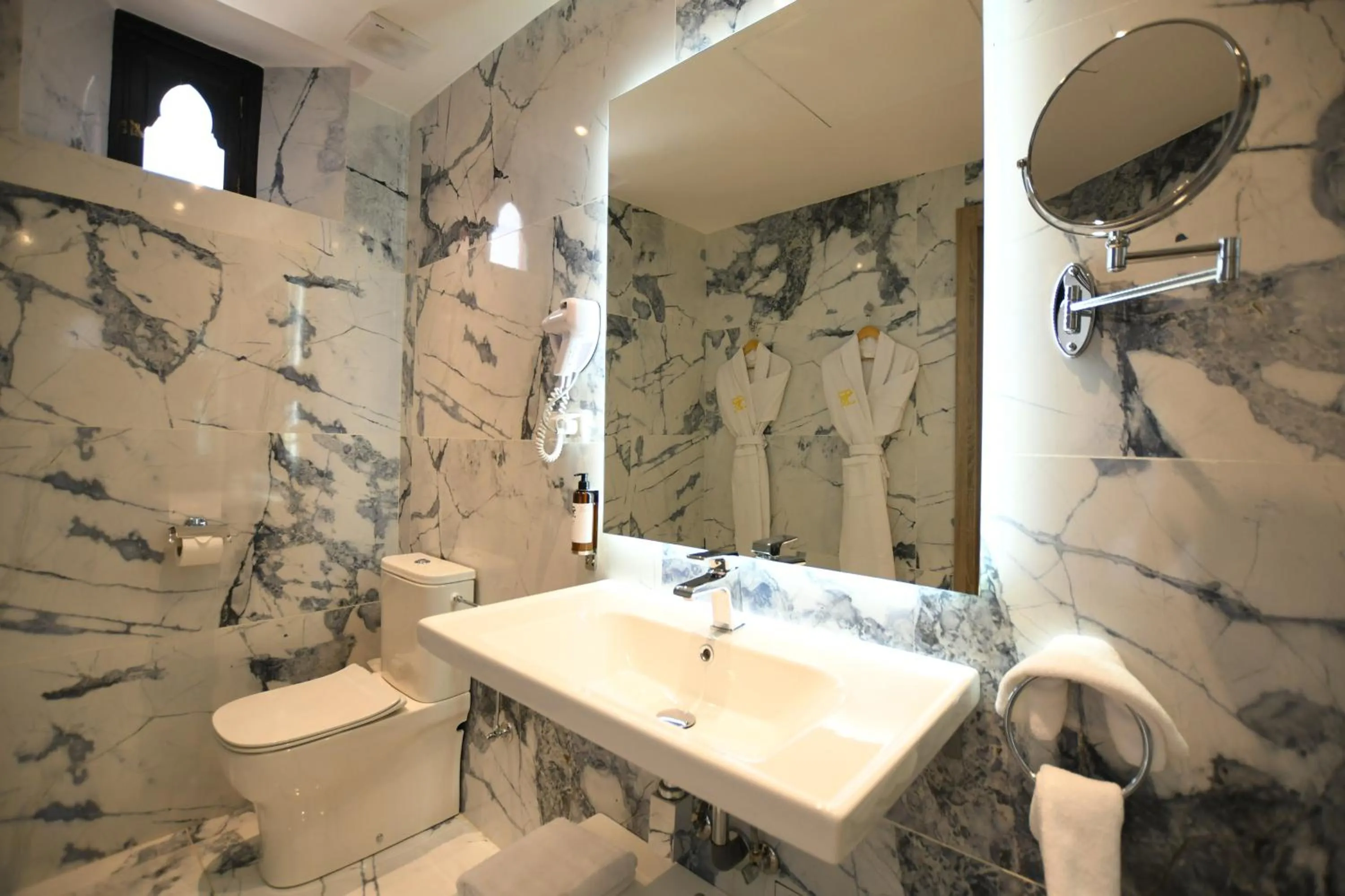 Bathroom in 555 Hotel Clubbing Adults Only