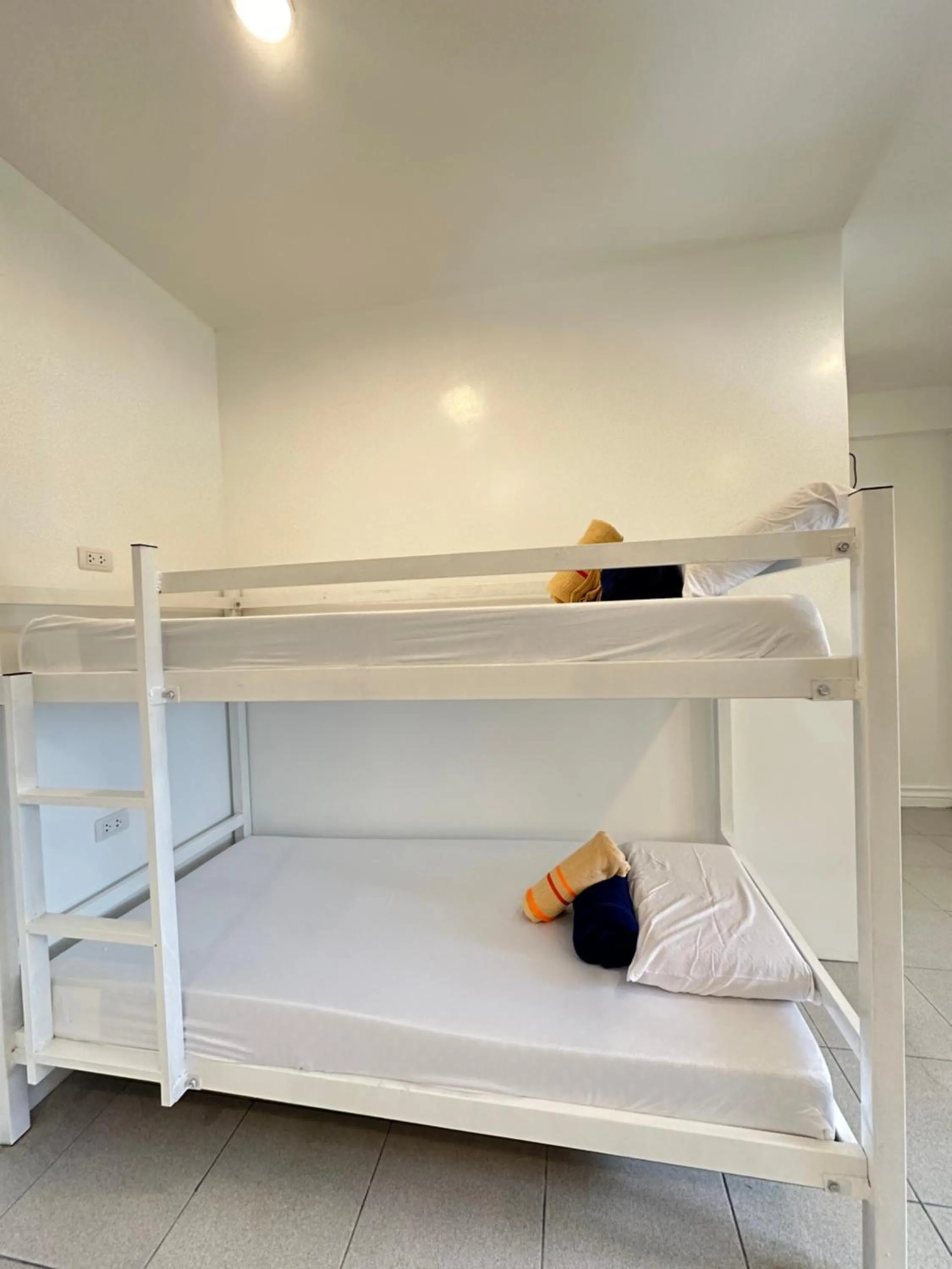 Bed in Gracey Dive Resort and Restaurant