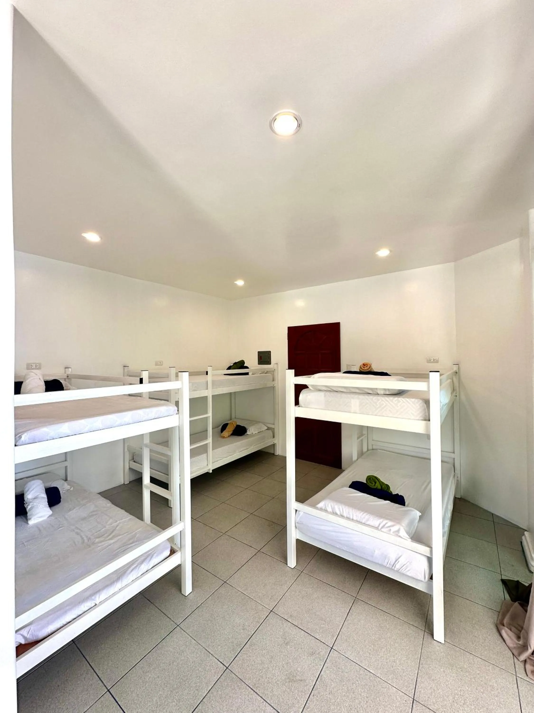 Bed in Gracey Dive Resort and Restaurant