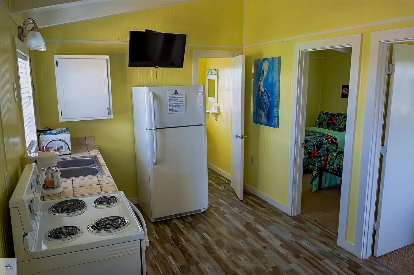 Kitchen or kitchenette in Blue Dolphin Inn and Cottages