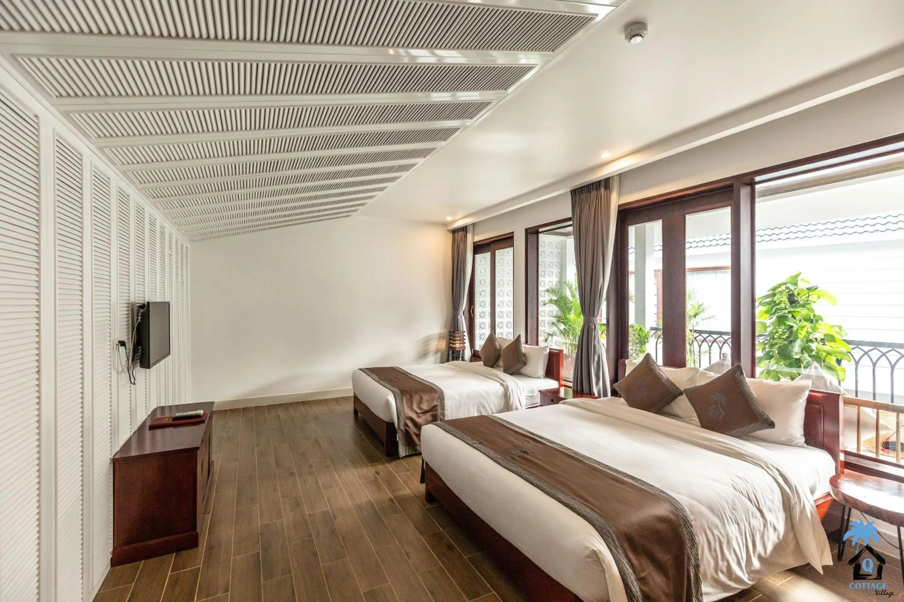 Photo of the whole room, Bed in Cottage Village