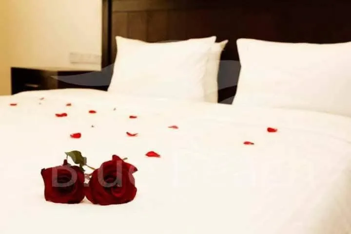 Bed in Blue Beach Hotel