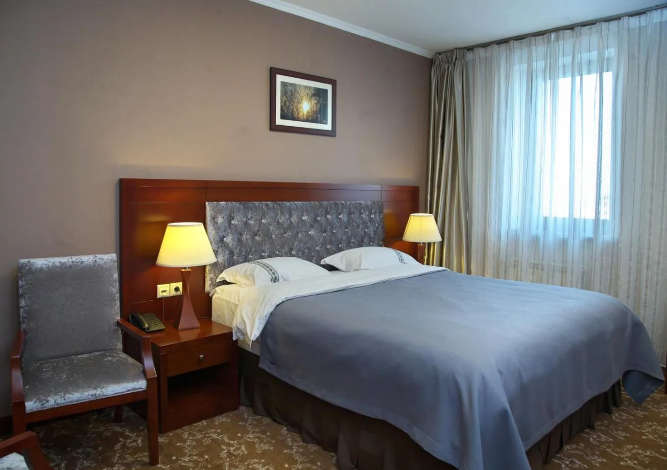Bed in Grand Voyage Hotel