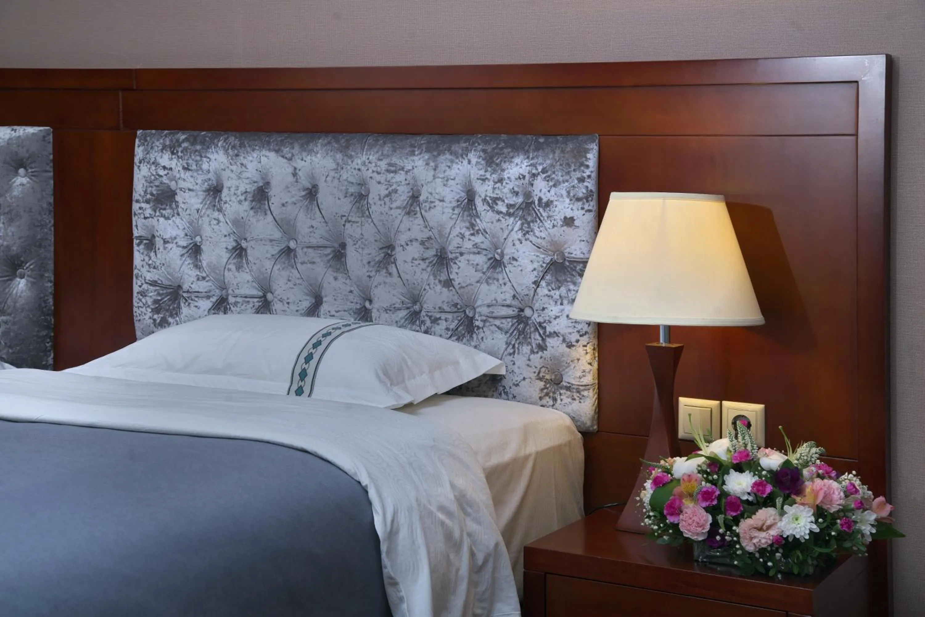 Bed in Grand Voyage Hotel