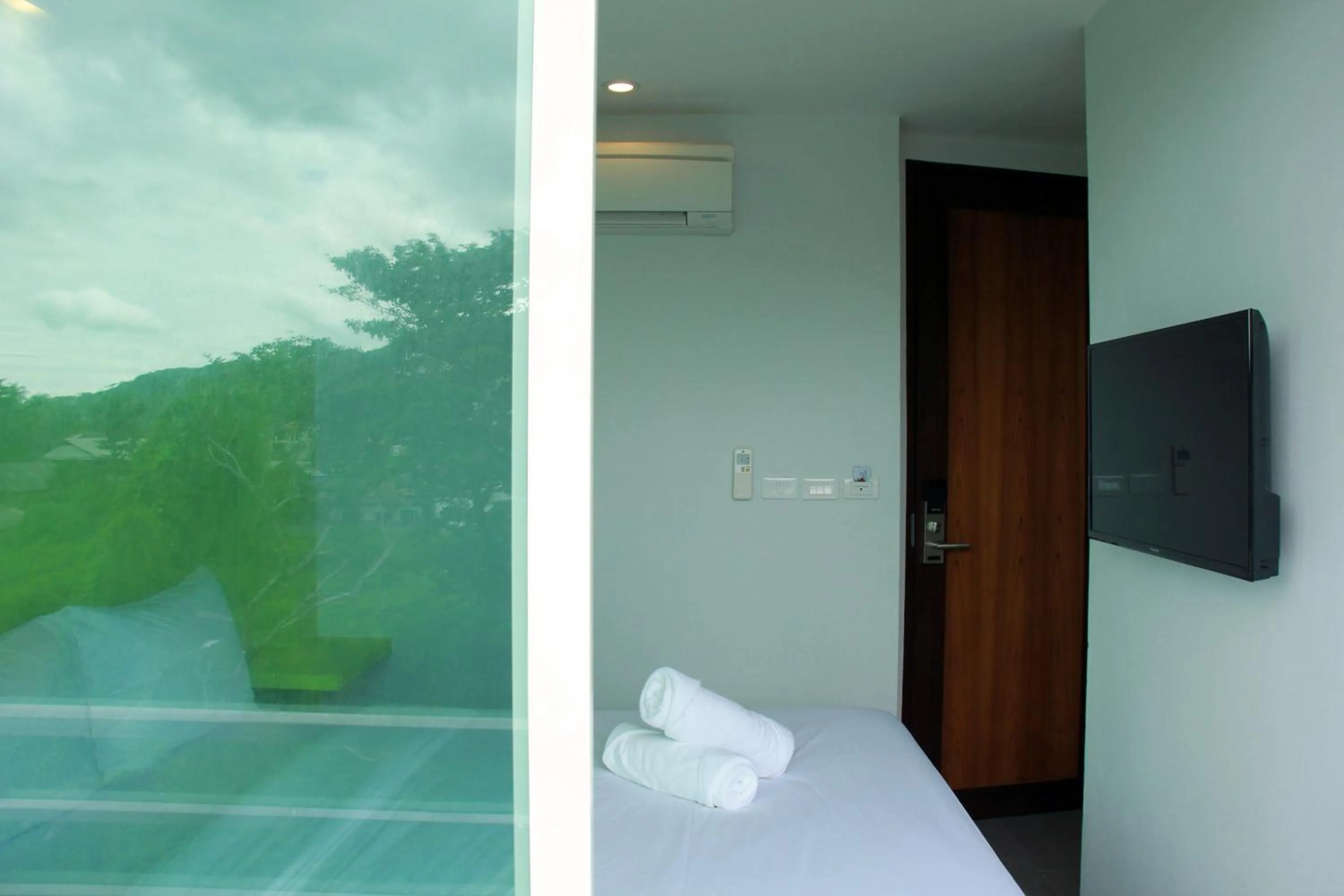 Bedroom in Cheeky Monkey's Samui