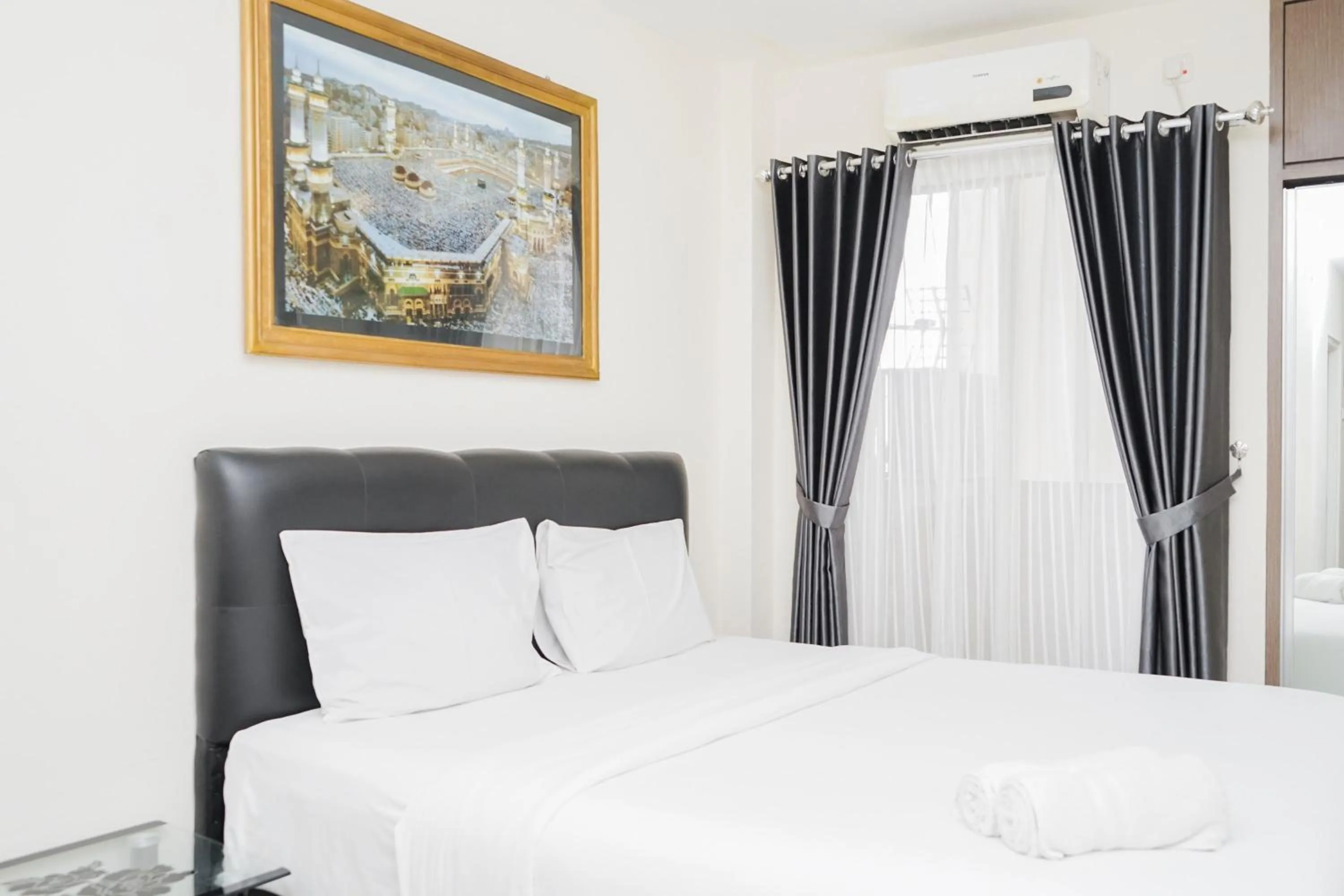 Bedroom, Bed in Homey and Comfact Studio at Medina Apartment By Travelio