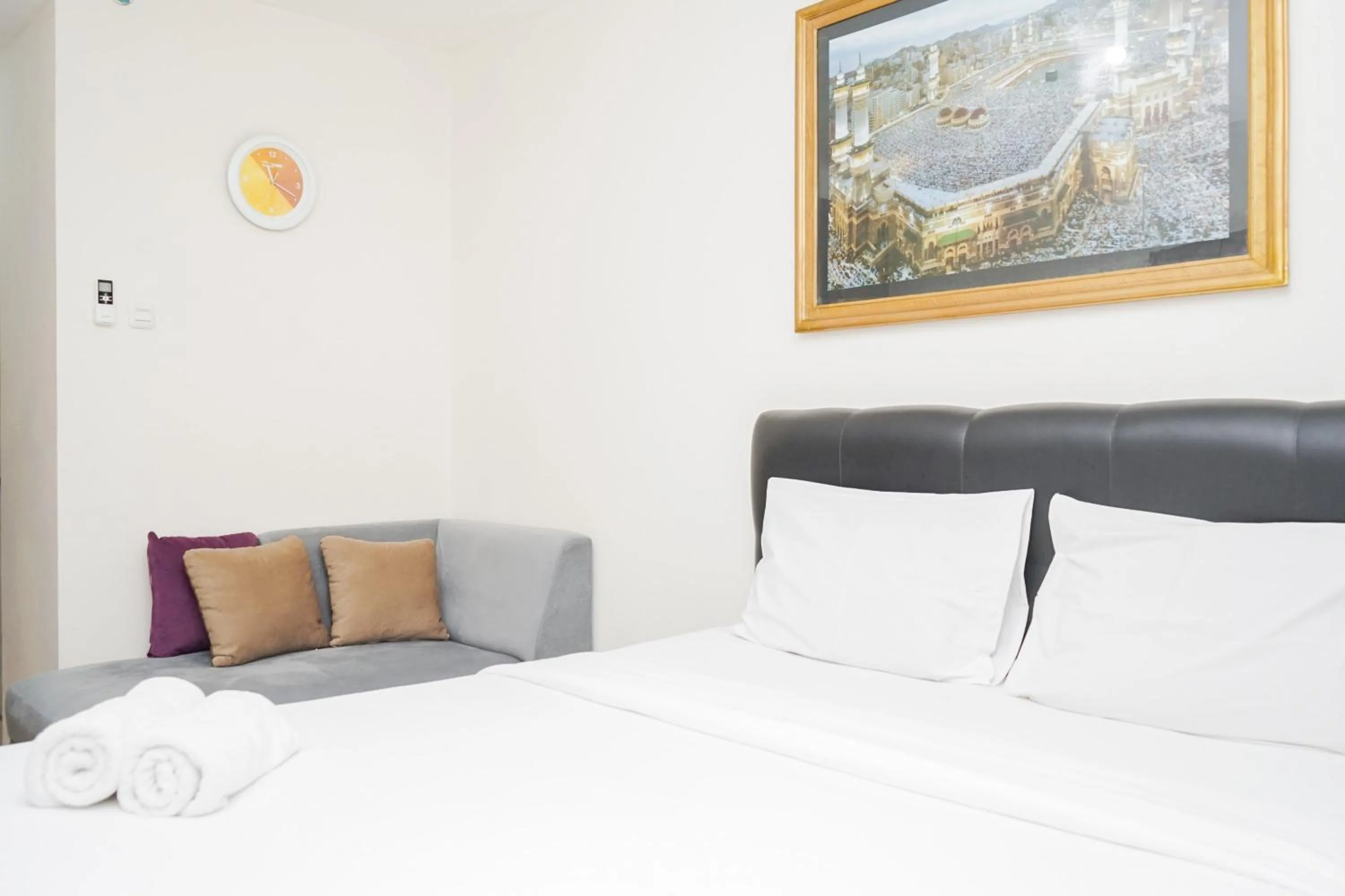 Bed in Homey and Comfact Studio at Medina Apartment By Travelio