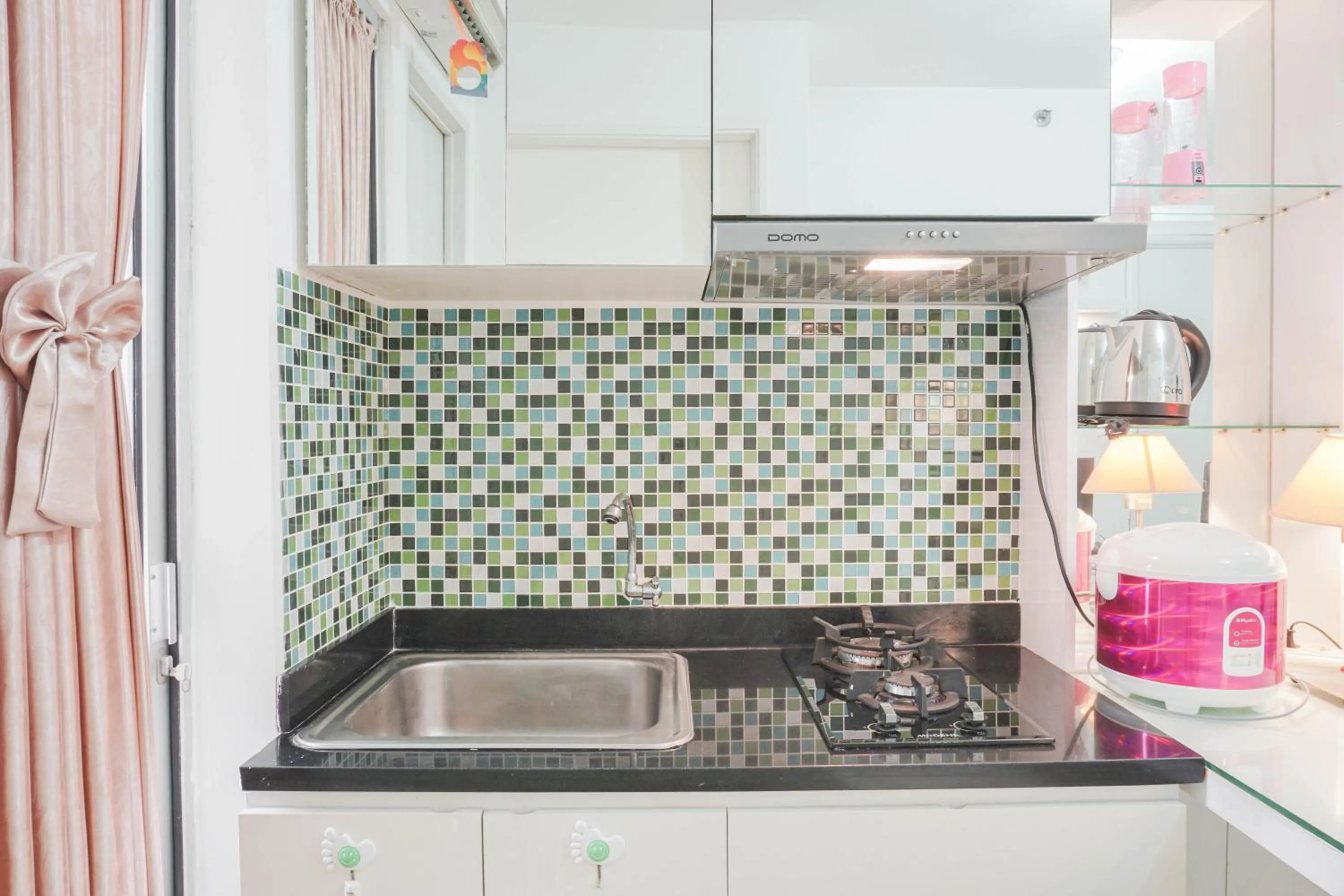 Elegant 2BR at Bassura City Apartment By Travelio