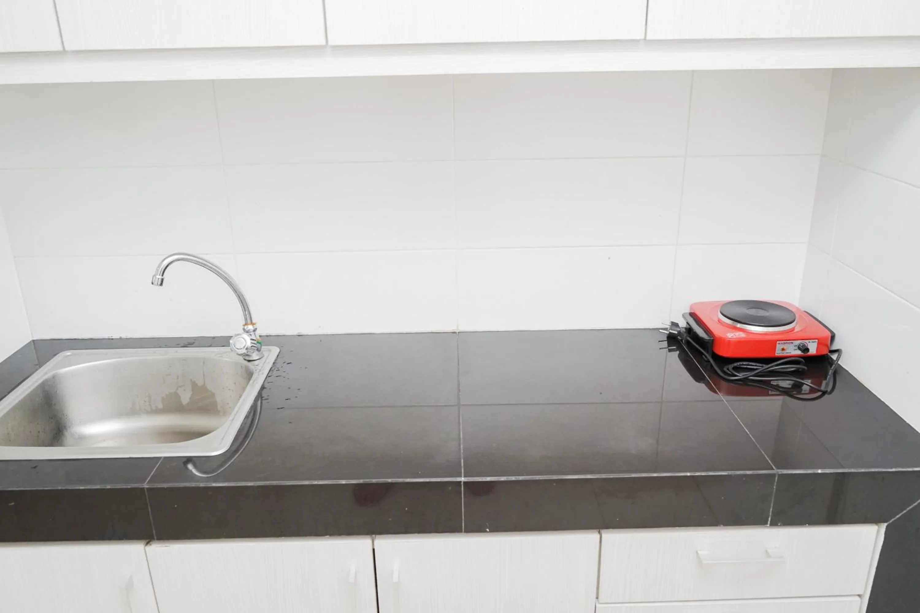 Functional Studio Apartment at Tuscany Residences BSD City By Travelio