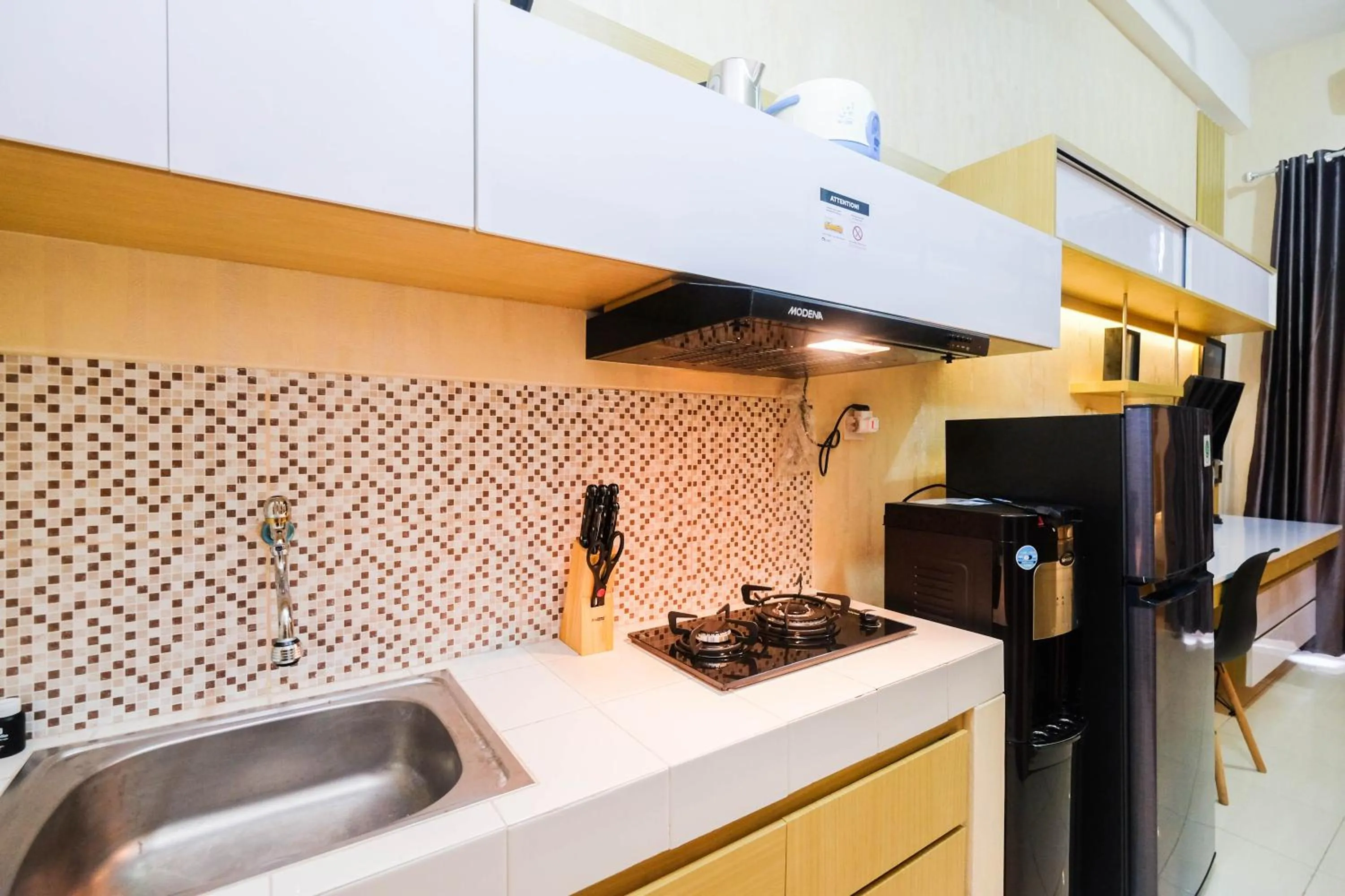 Fully Furnished Studio with Comfortable Design Dave Apartment By Travelio