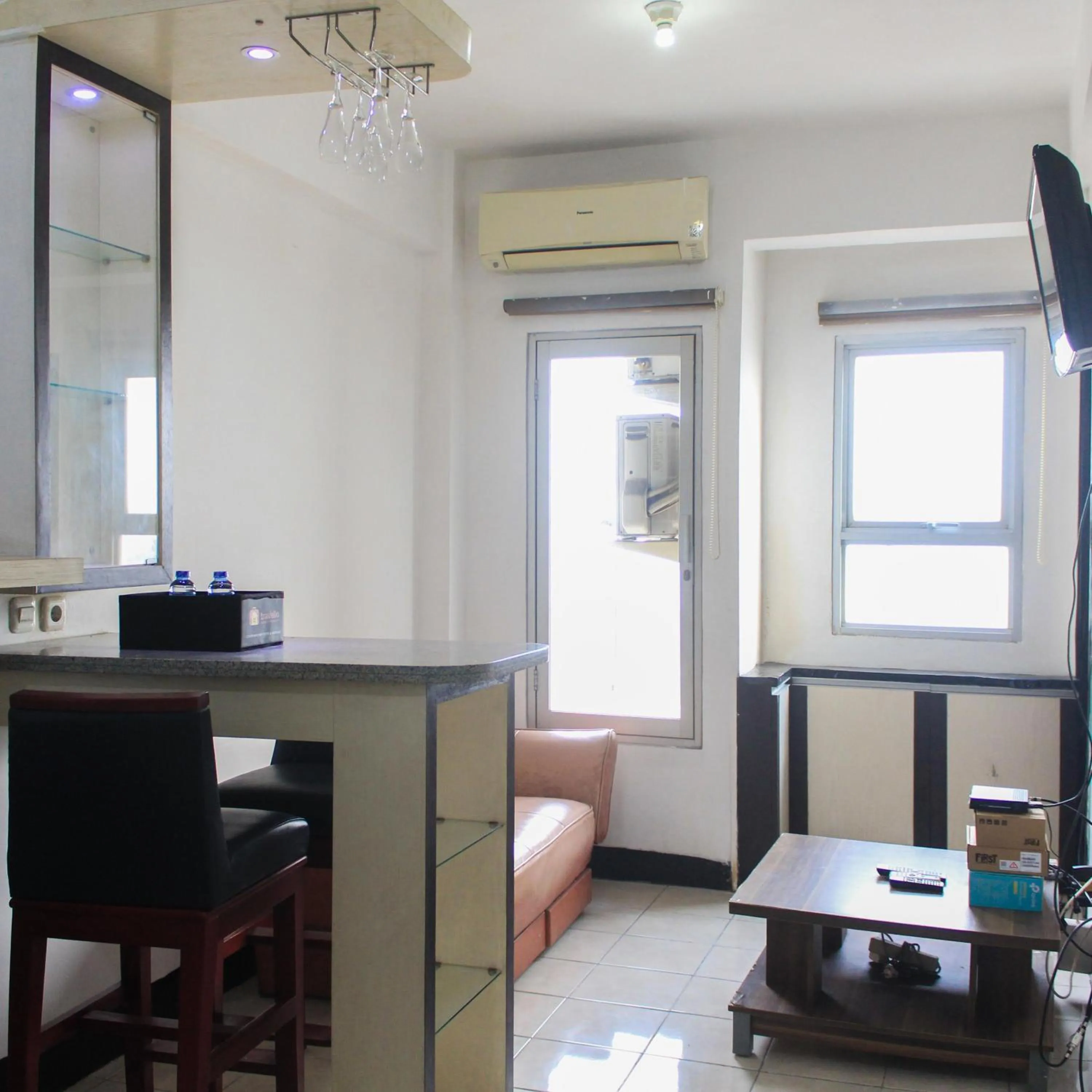 Best Price 1BR with Extra Room at Menara Latumenten Apartment Grogol By Travelio