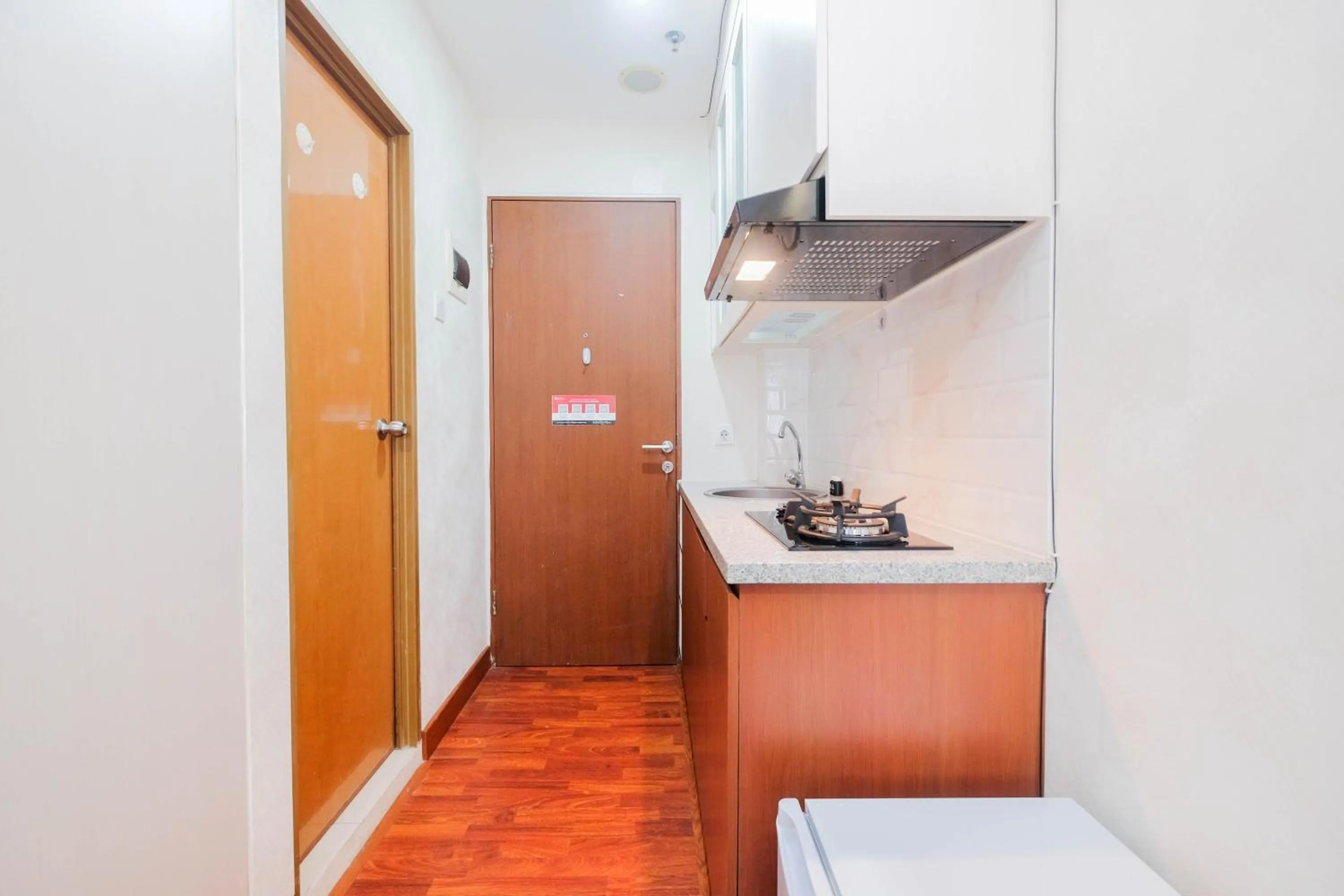 Kitchen or kitchenette in Cozy and Simply Studio Tifolia Apartment near Kelapa Gading By Travelio