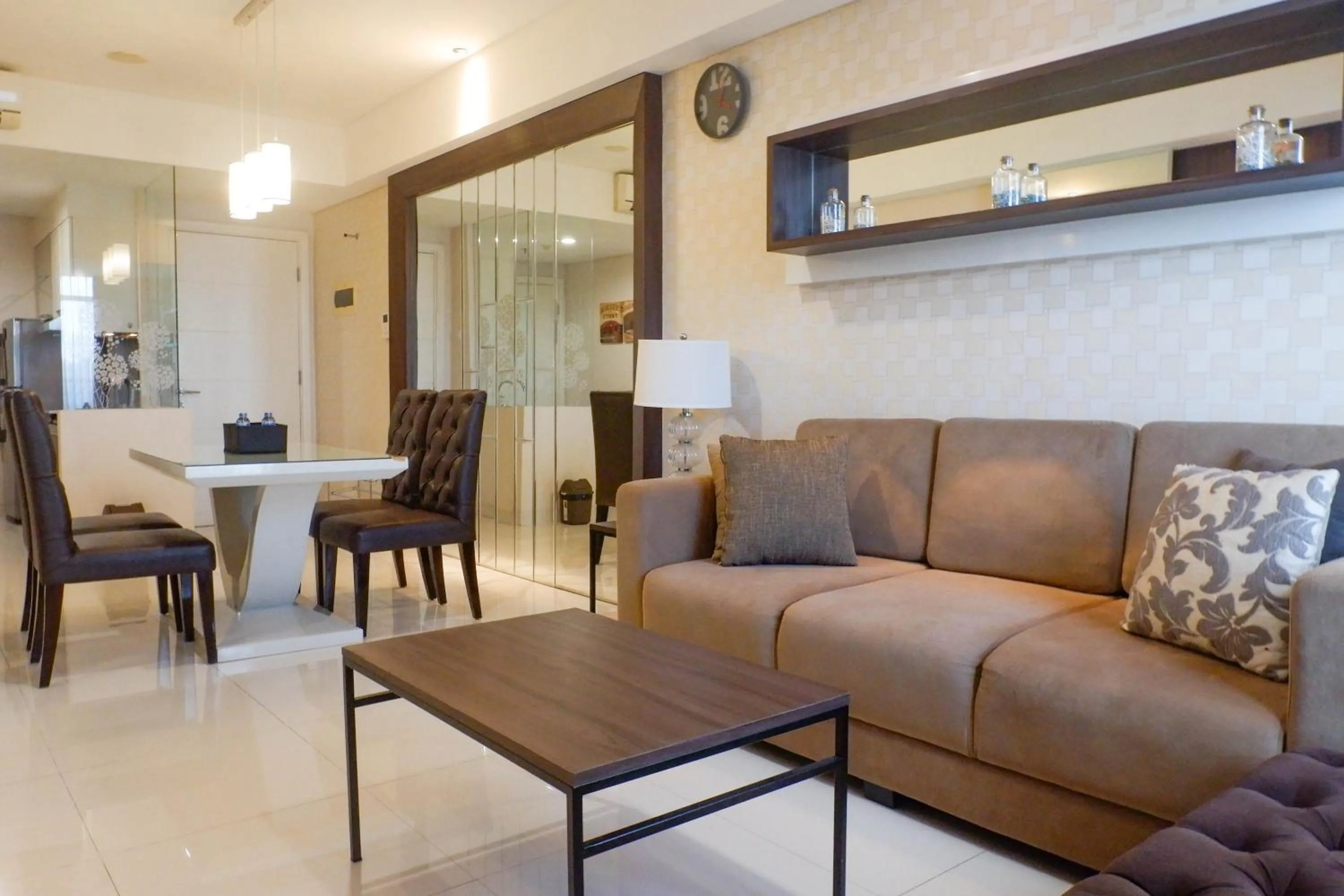 Living room in Scenic Modern 2BR Apartment at Trillium Residence By Travelio