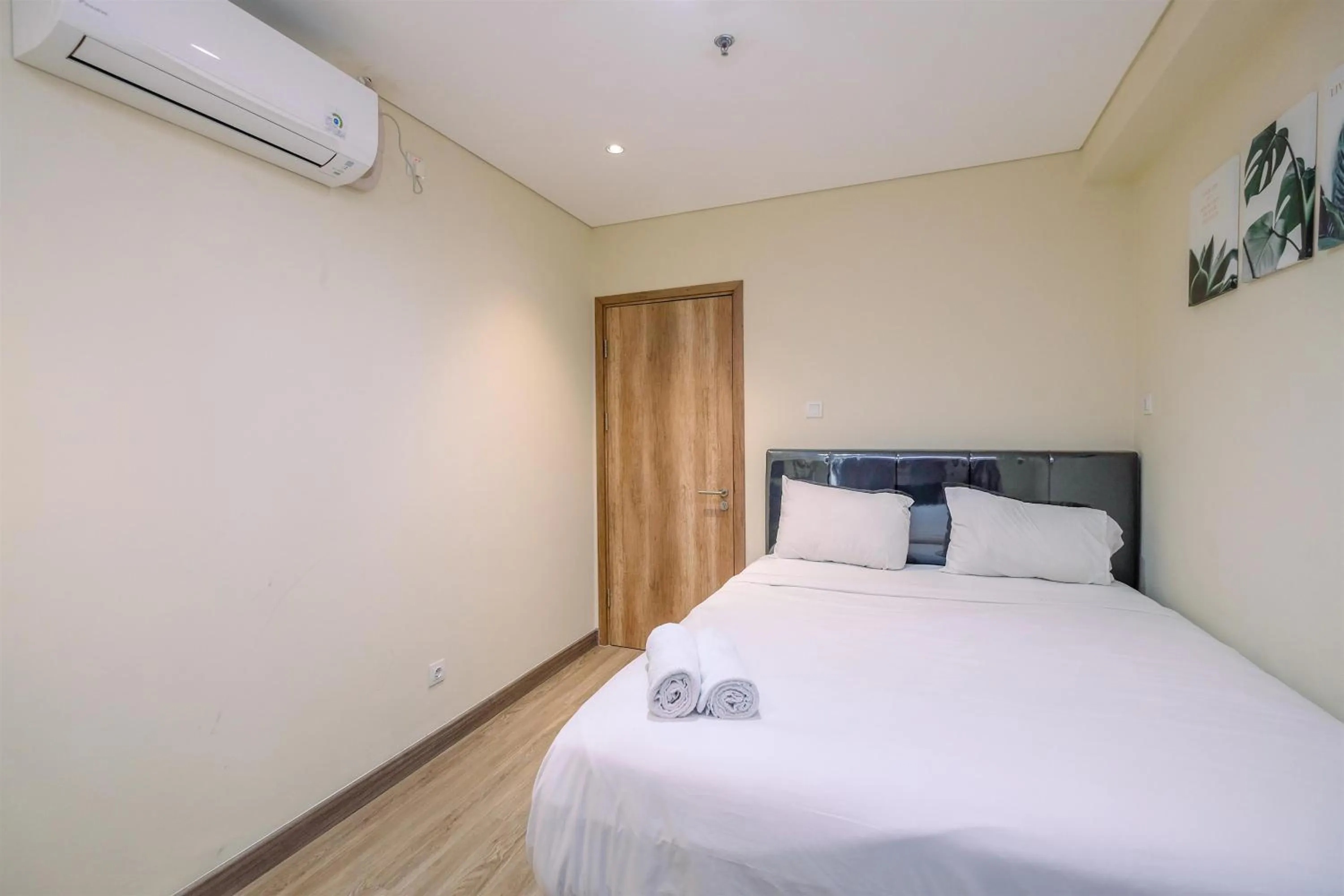 Bed in Simply 1BR Apartment at Pejaten Park Residence By Travelio