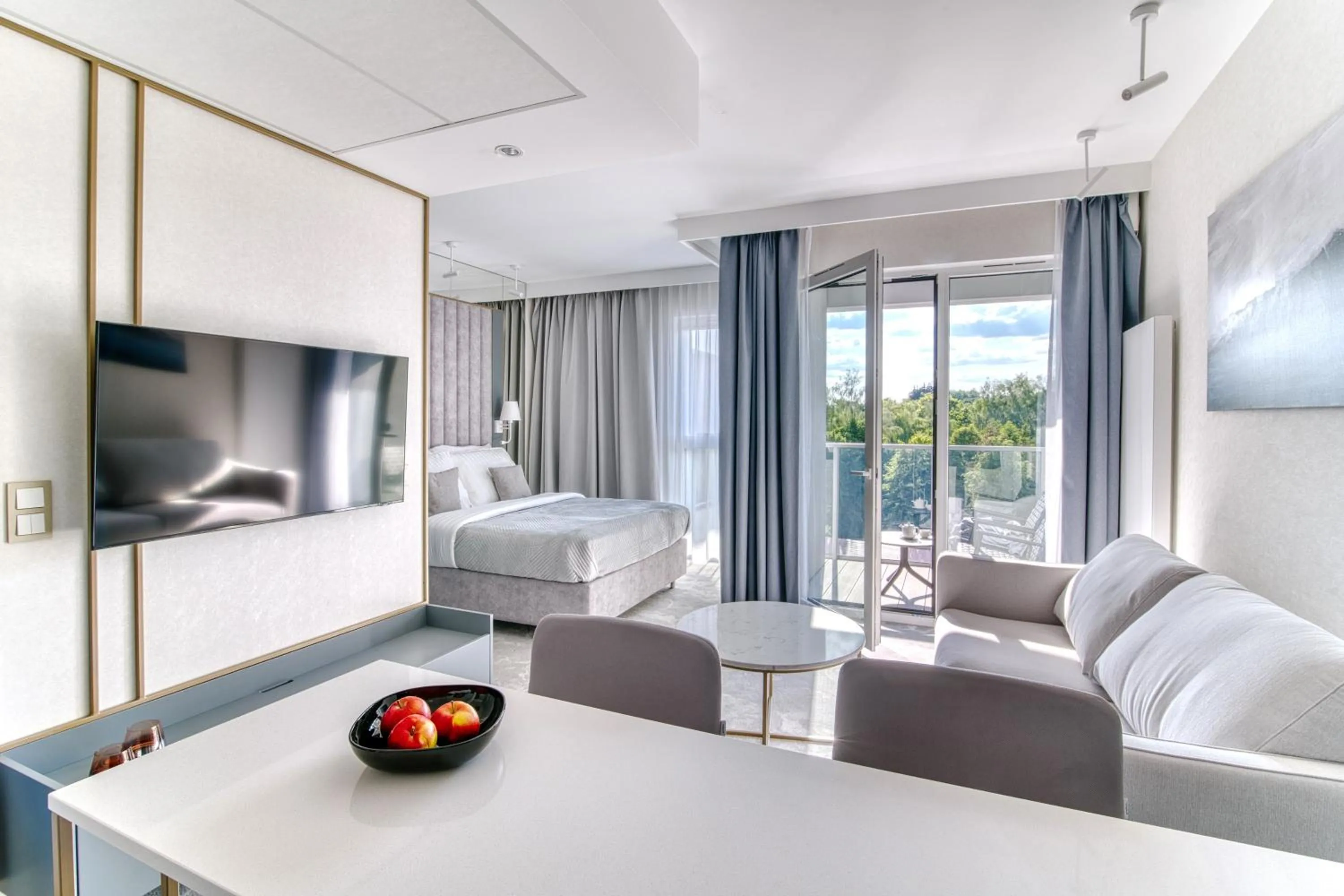 Communal lounge/ TV room in Apartamenty Premium N11 Mikołajki - Destigo Hotels