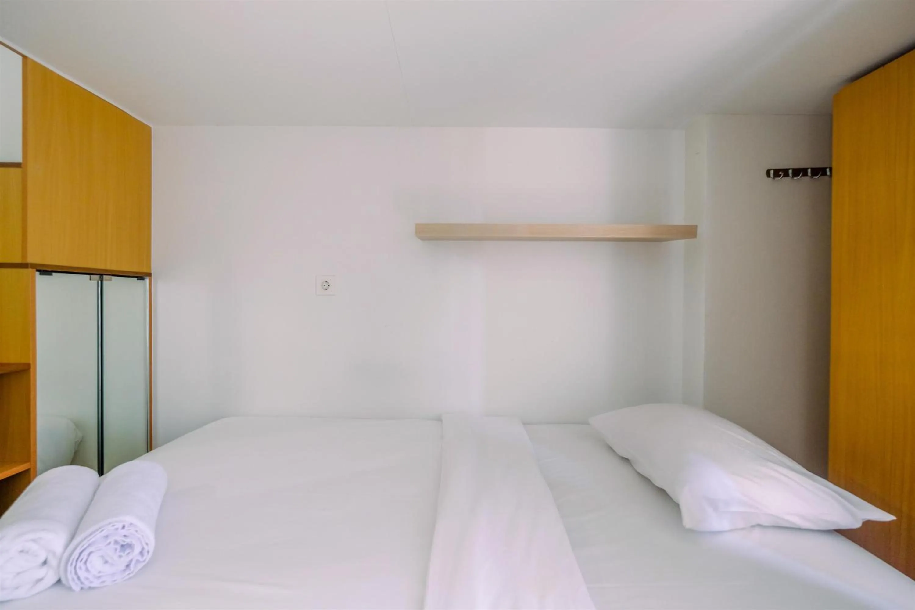 Bed in Great Deal Studio at Dave Apartment near Campus By Travelio