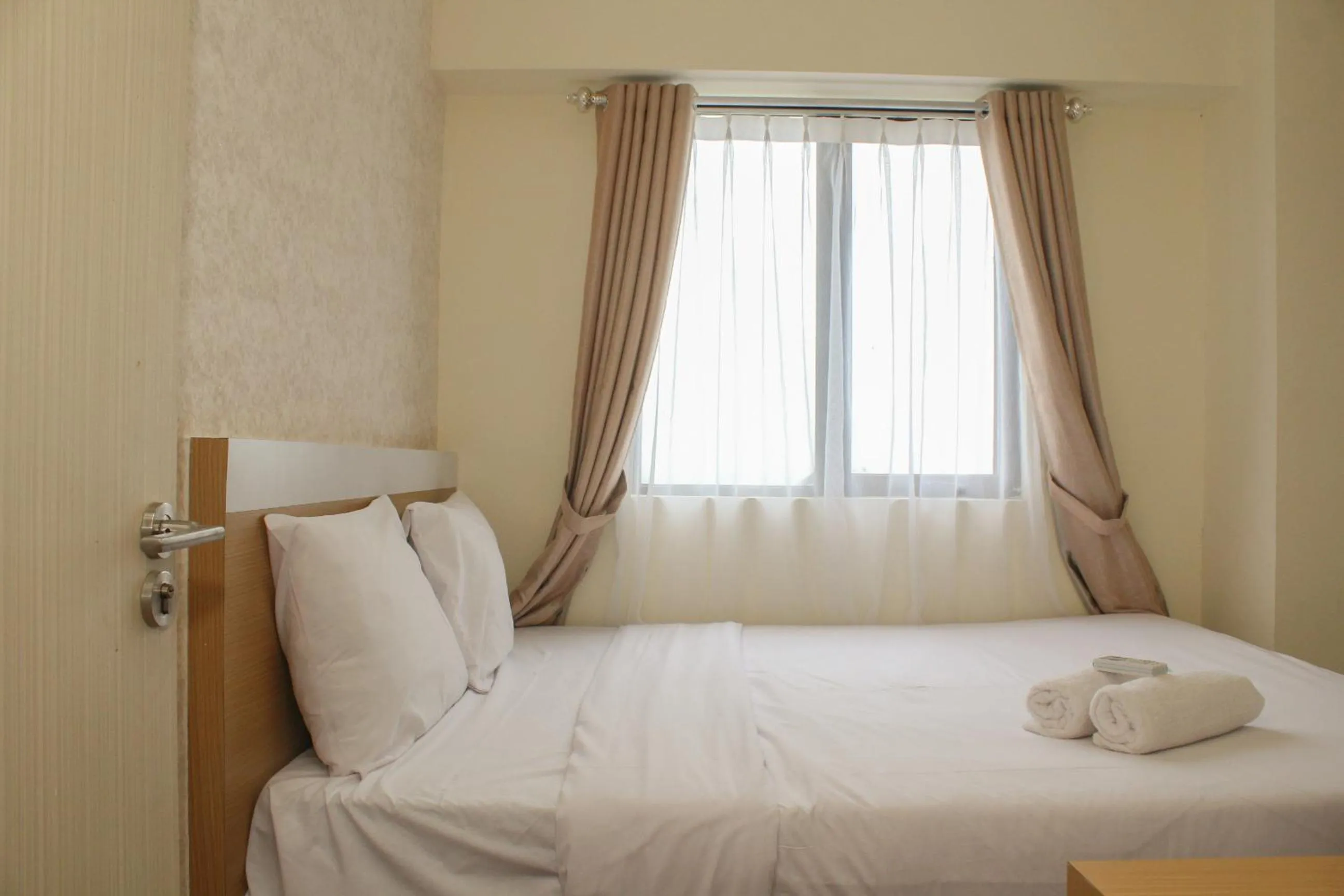 Two-Bedroom Apartment in Comfort and Nice 2BR at Meikarta Apartment By Travelio