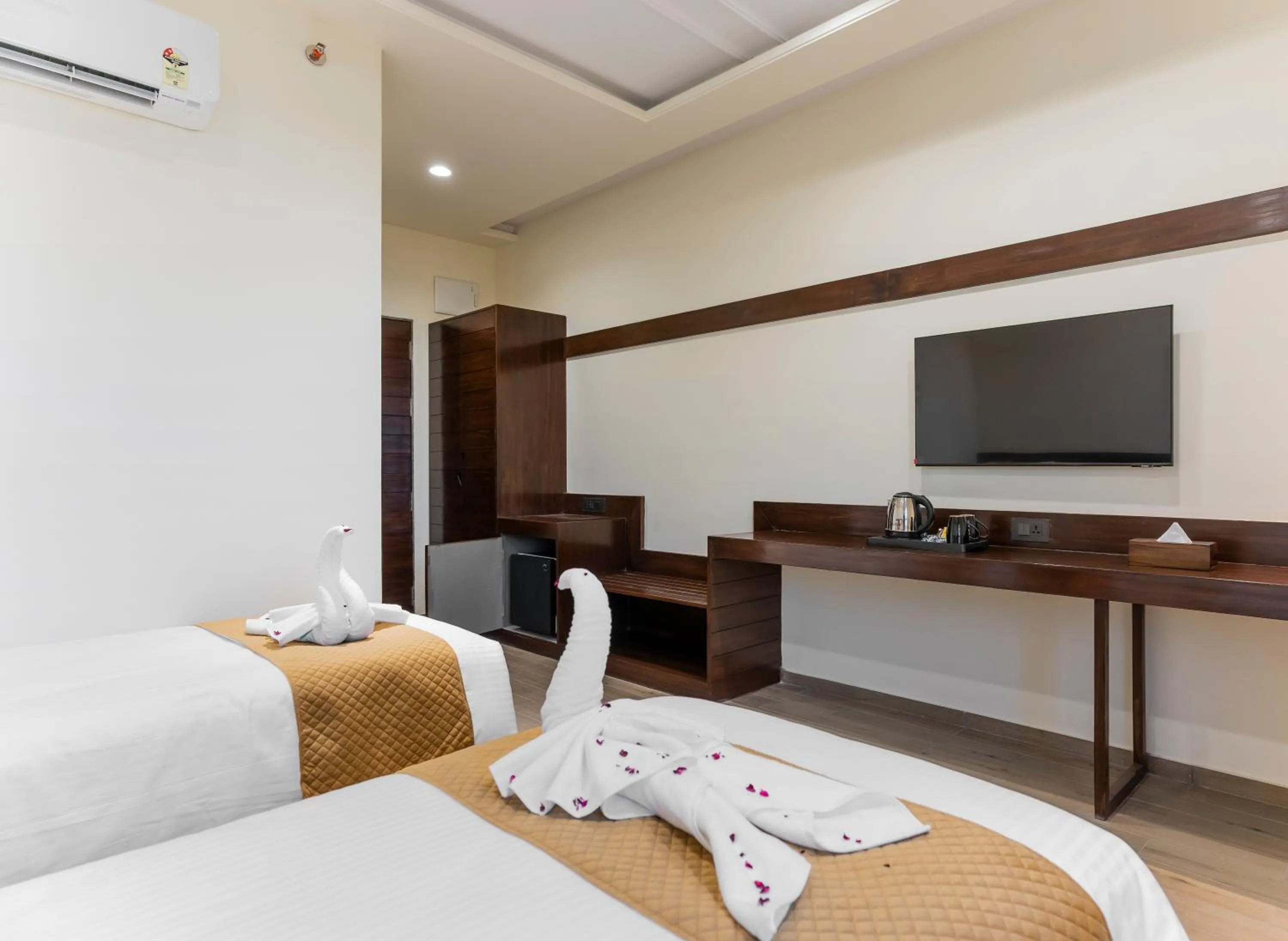 Bed in The Belita Hotel & Spa