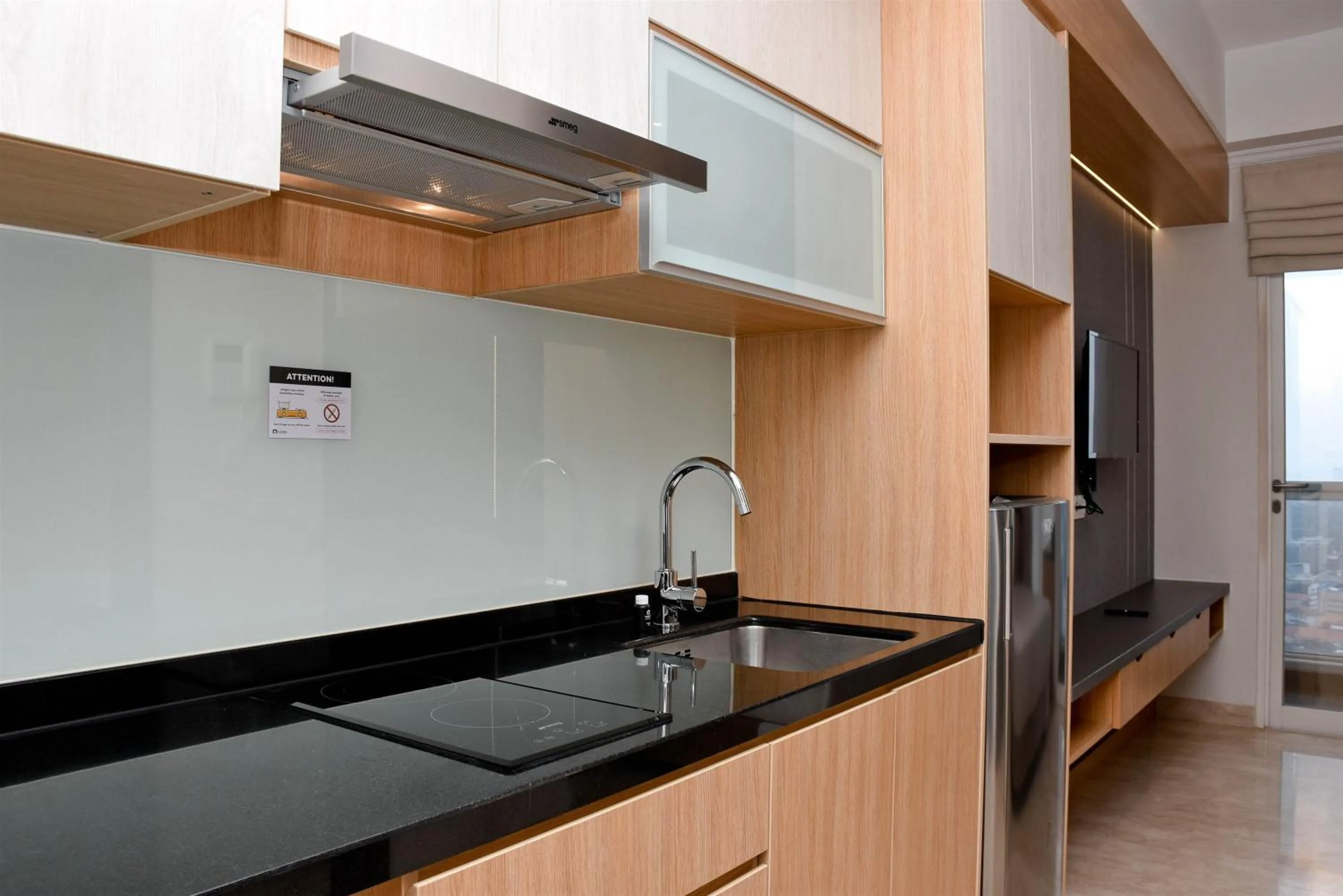 Cozy Living Studio at Menteng Park Apartment By Travelio