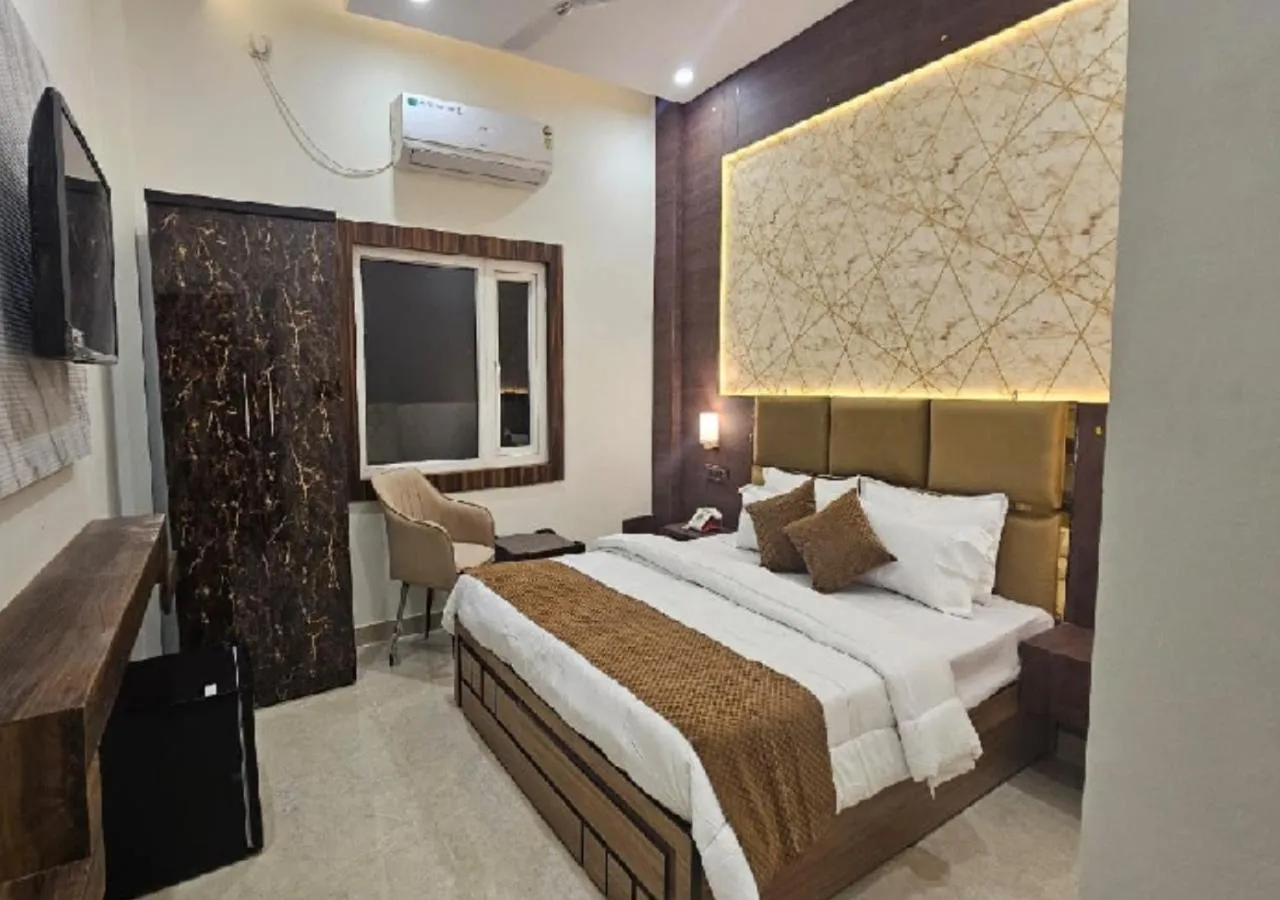 Bed in Triveni International
