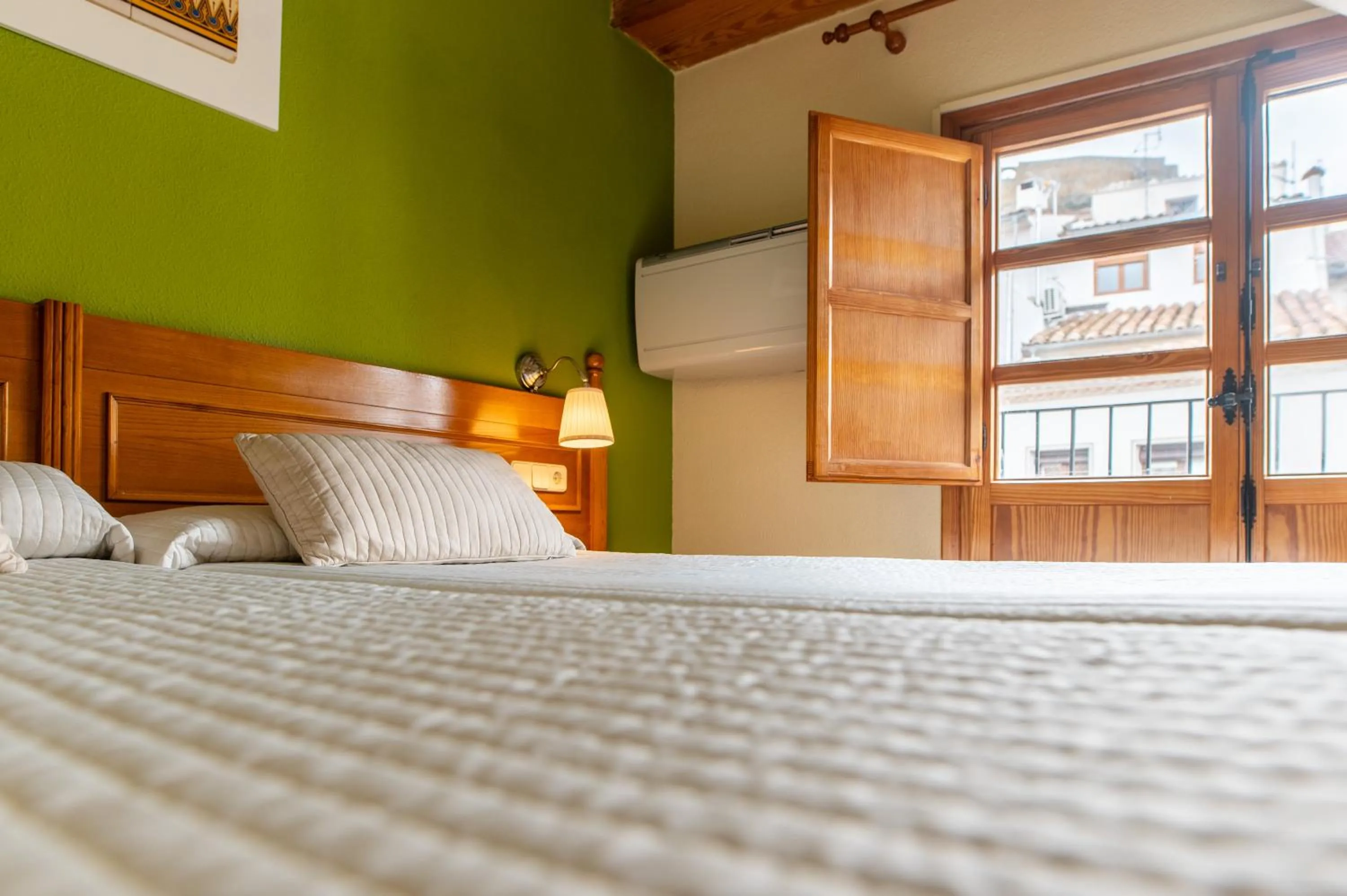 Bed in Hotel Rey Don Jaime