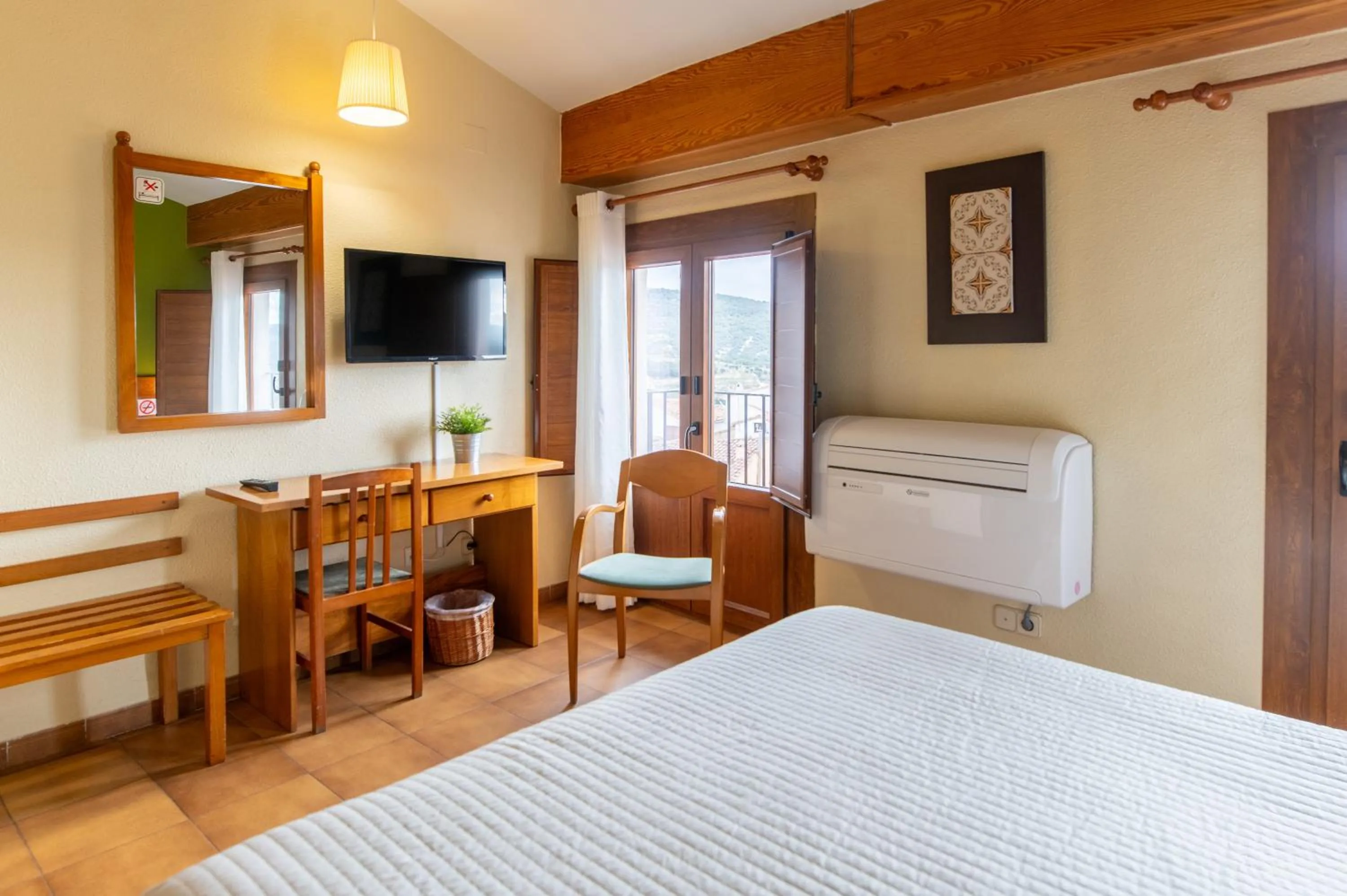 Bed in Hotel Rey Don Jaime