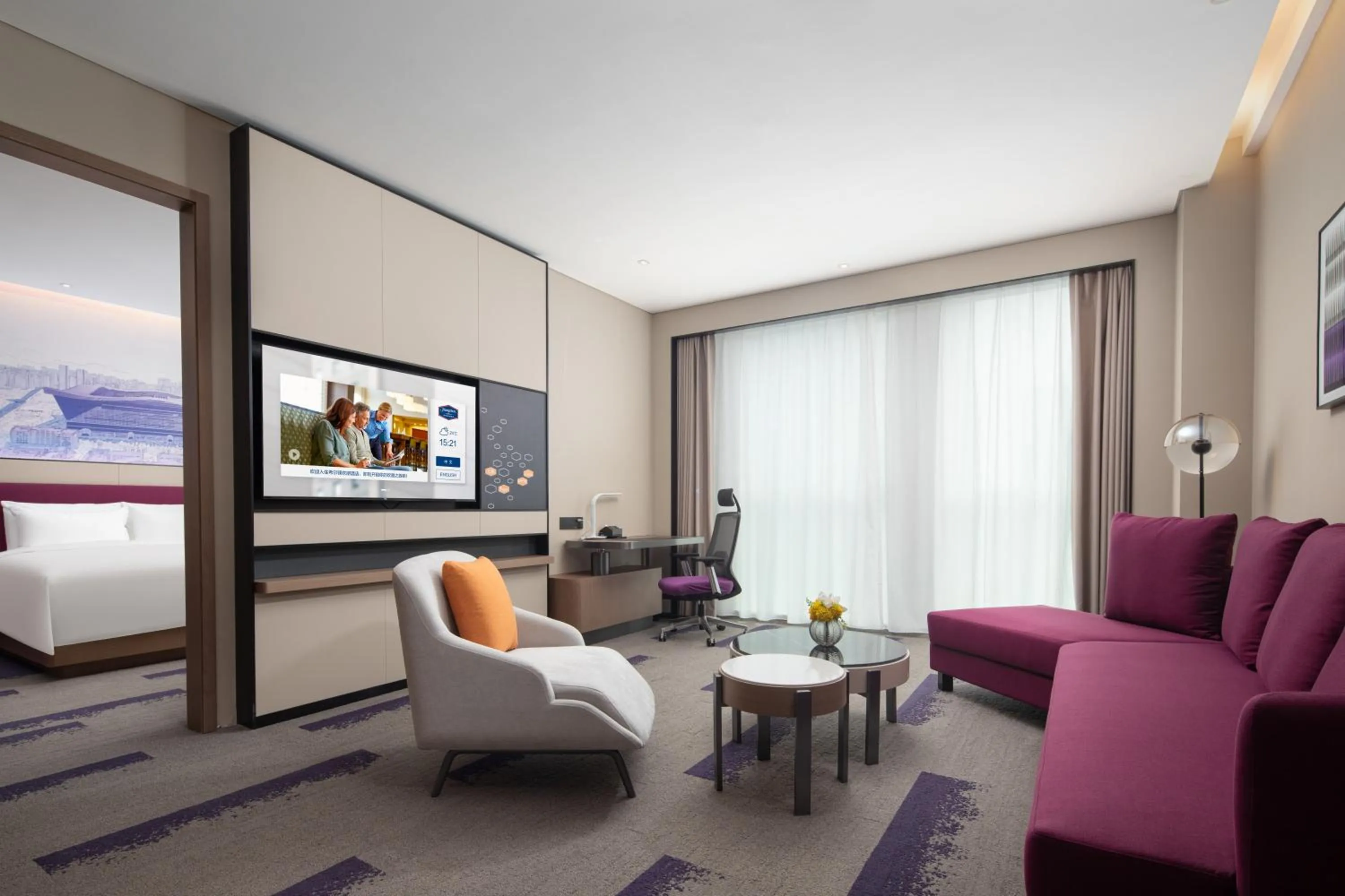 Communal lounge/ TV room in Hilton by Hampton Chengdu North Railway Station