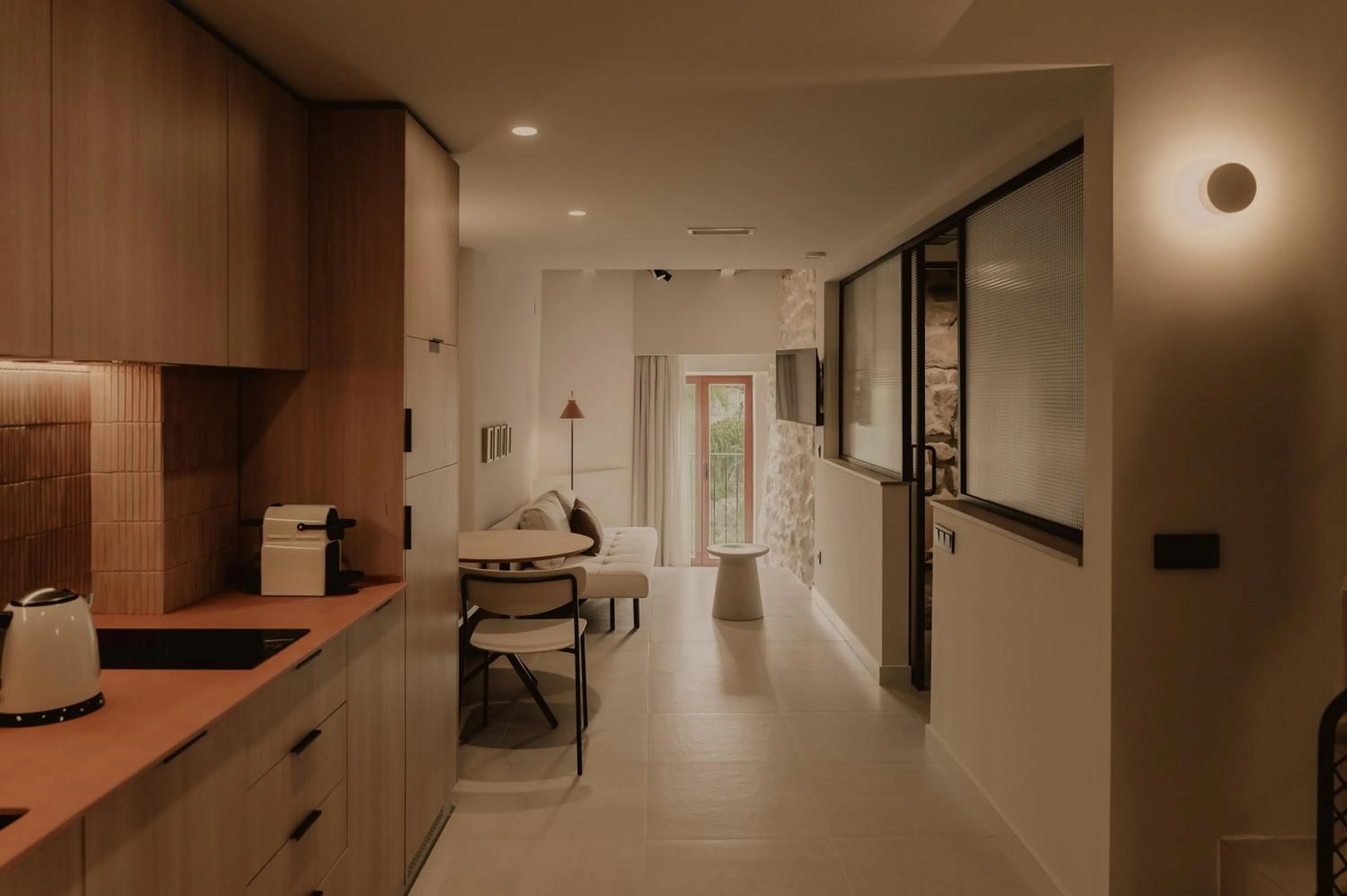 Kitchen or kitchenette in Pau Suites