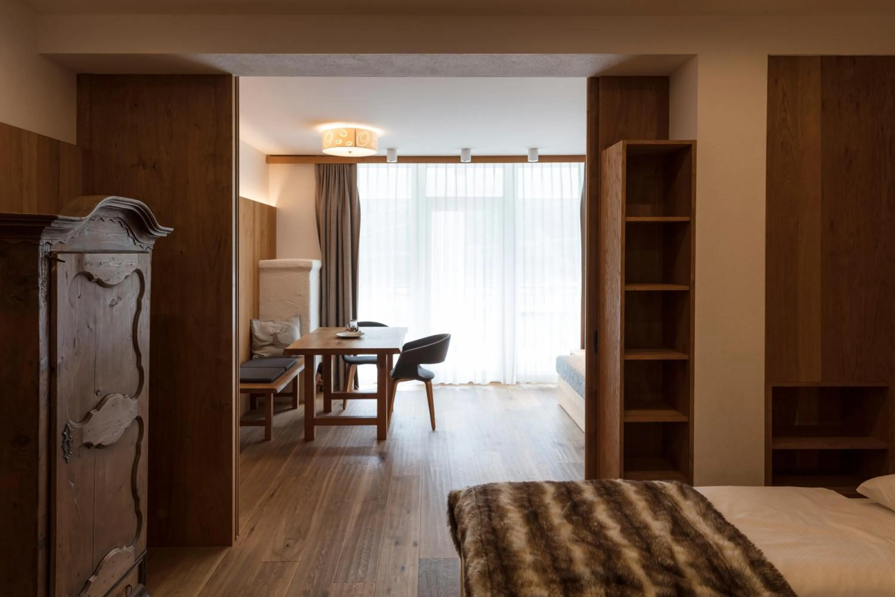 Living room, Bed in ArlBerglife Ferienresort