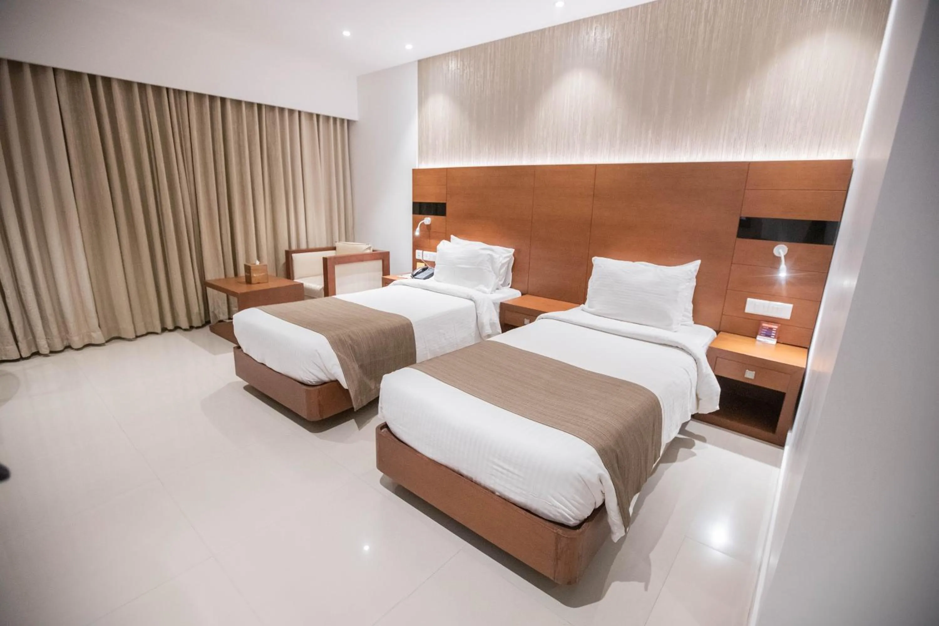 Bed in Hotel Niya Regency