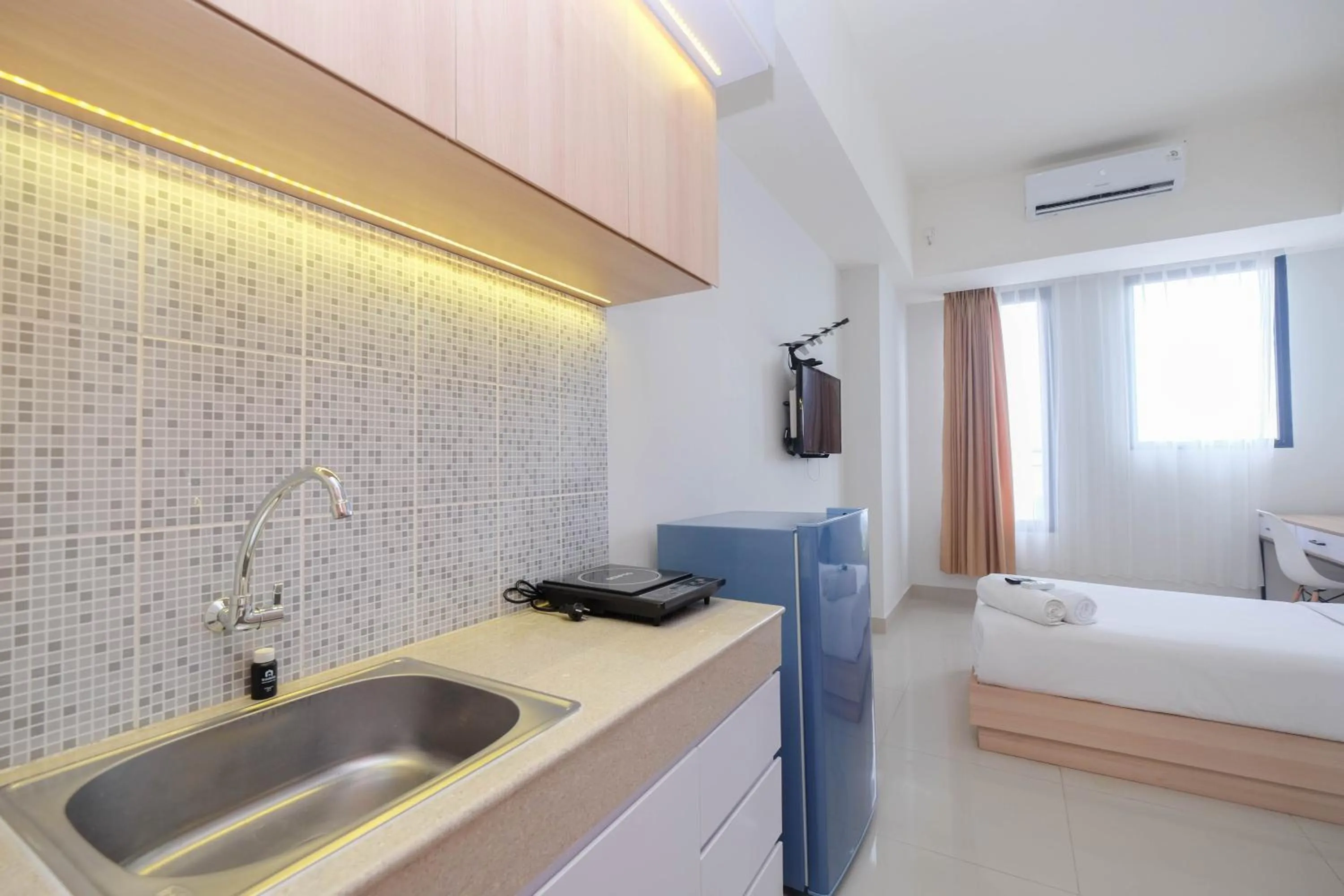 Pleasurable Studio at Evenciio Apartment near Campus Area By Travelio